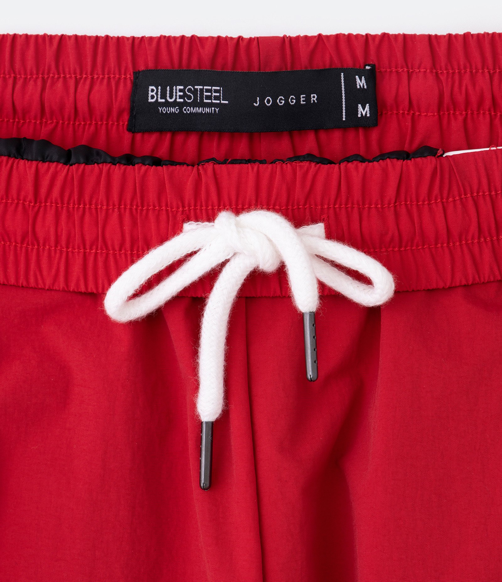 Calça Jogger em Poliamida com Blocos de Cor e Lettering Vermelho/ Branco/ Preto 7