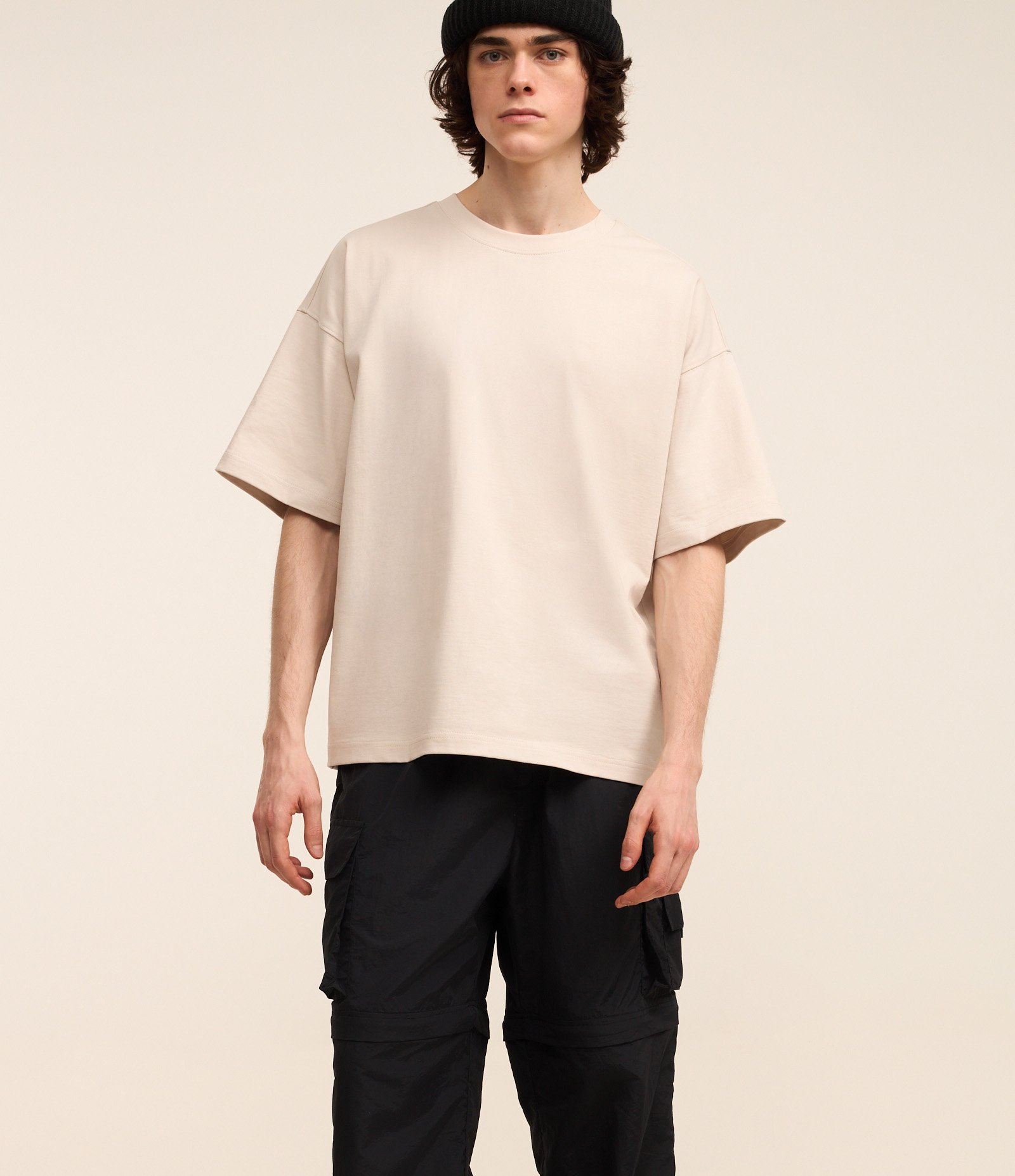 Calça Paper Touch Vira Bermuda com Puxador na Barra Preto 4