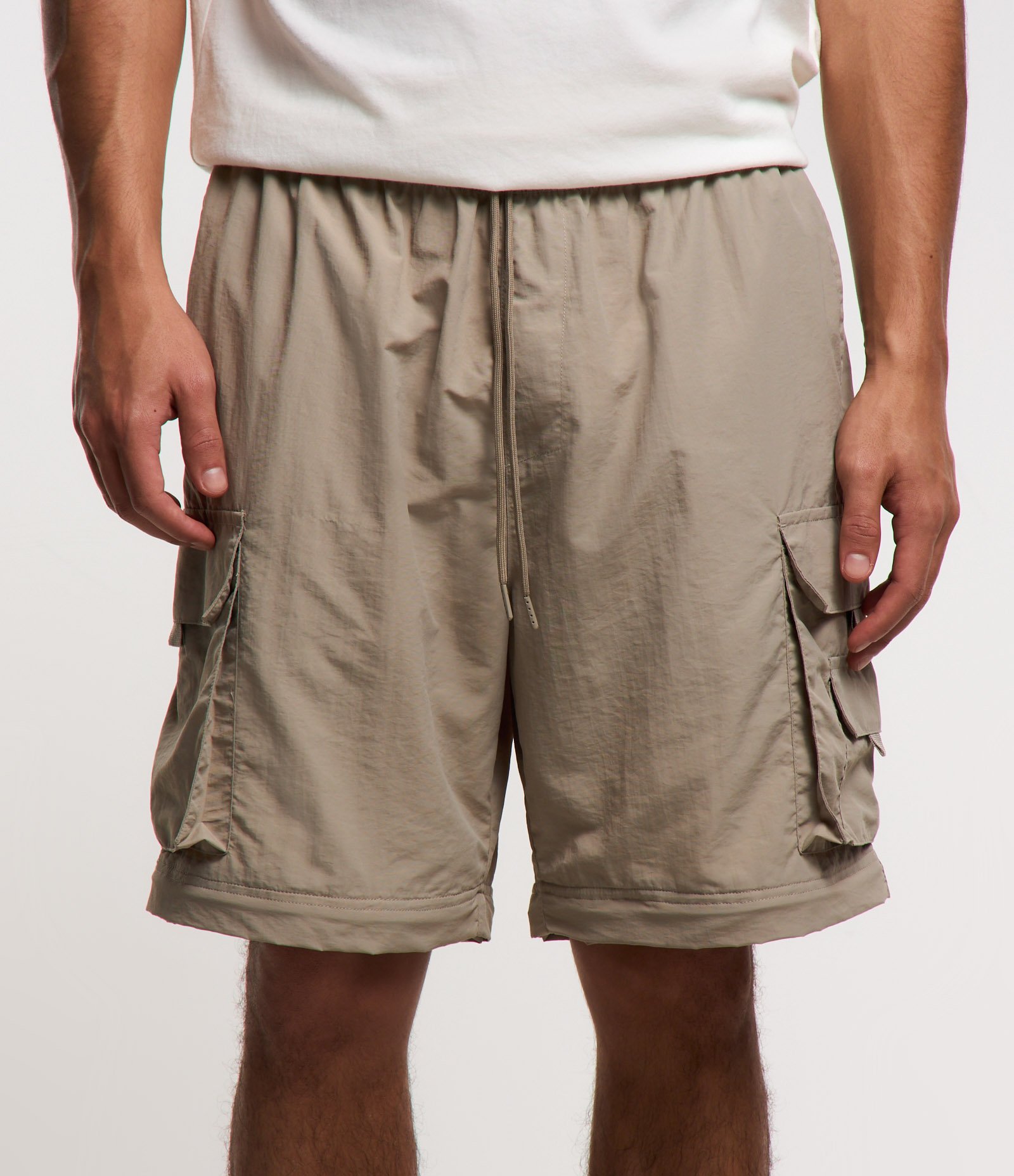 Calça Paper Touch Vira Bermuda com Puxador na Barra Bege 7