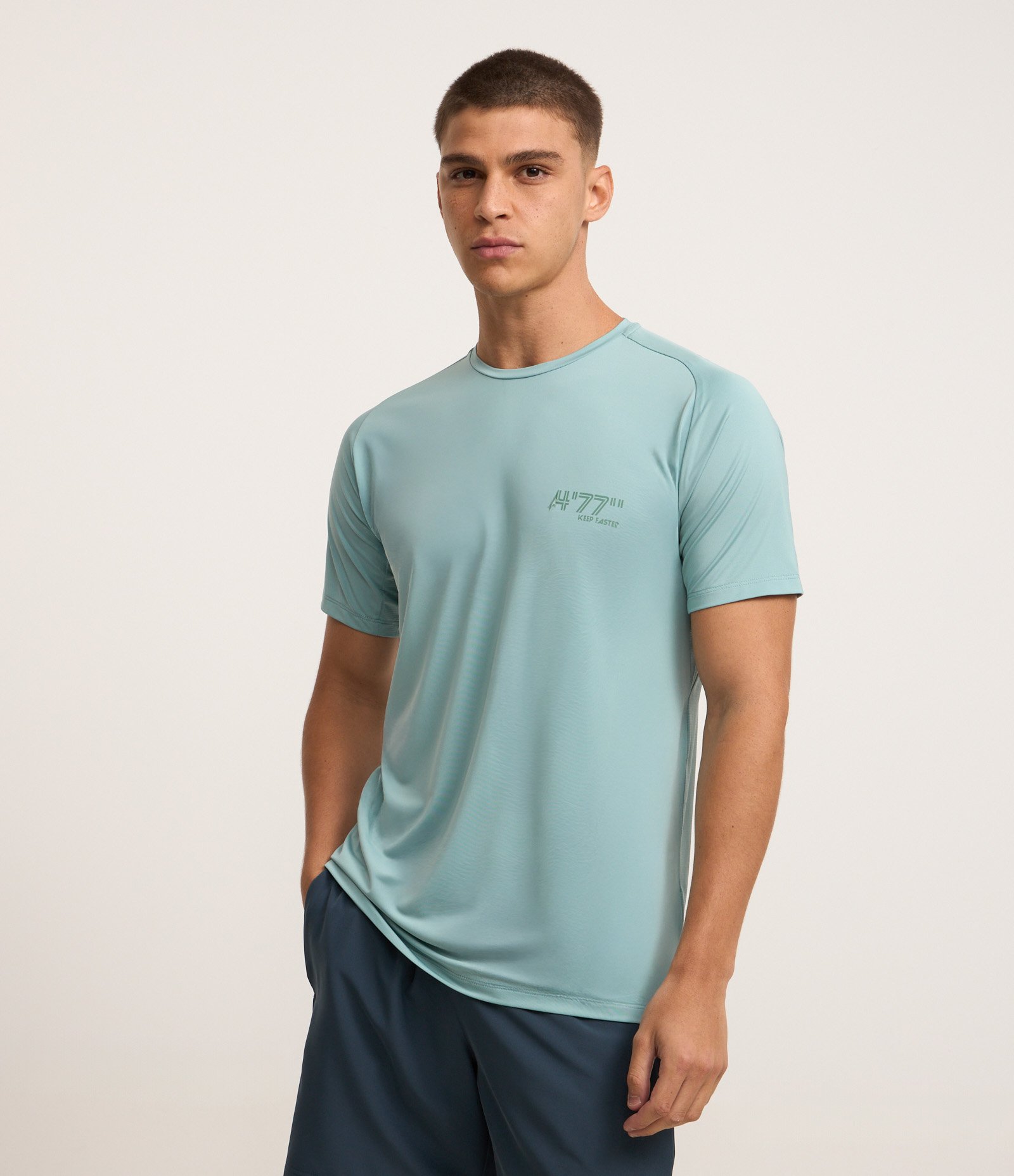 Camiseta Esportiva em Tecnologia Dry com Estampa Laser Curt e Cava Raglan Azul 1