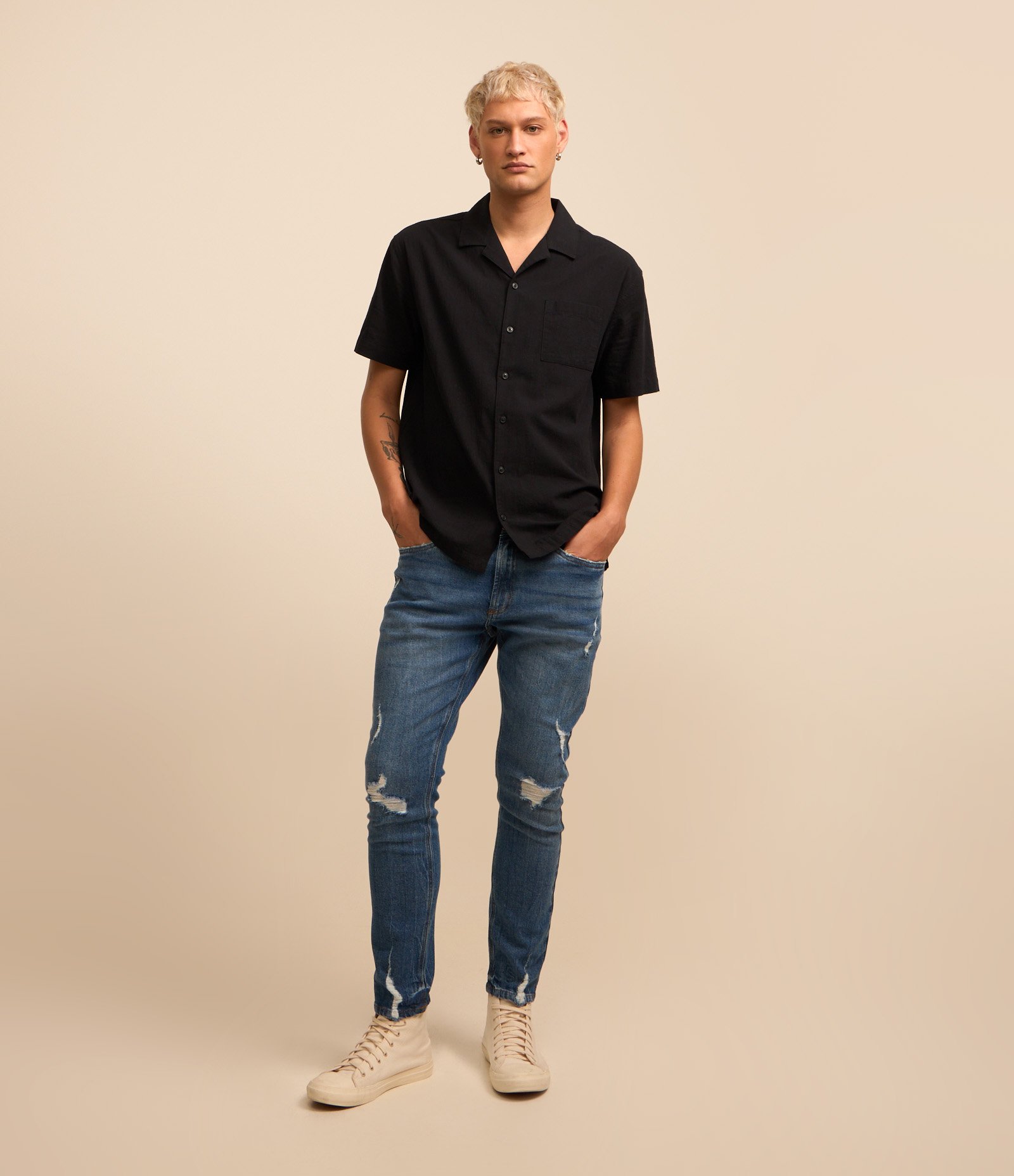 Calça Skinny Cropped em Jeans com Puídos Azul Médio 1