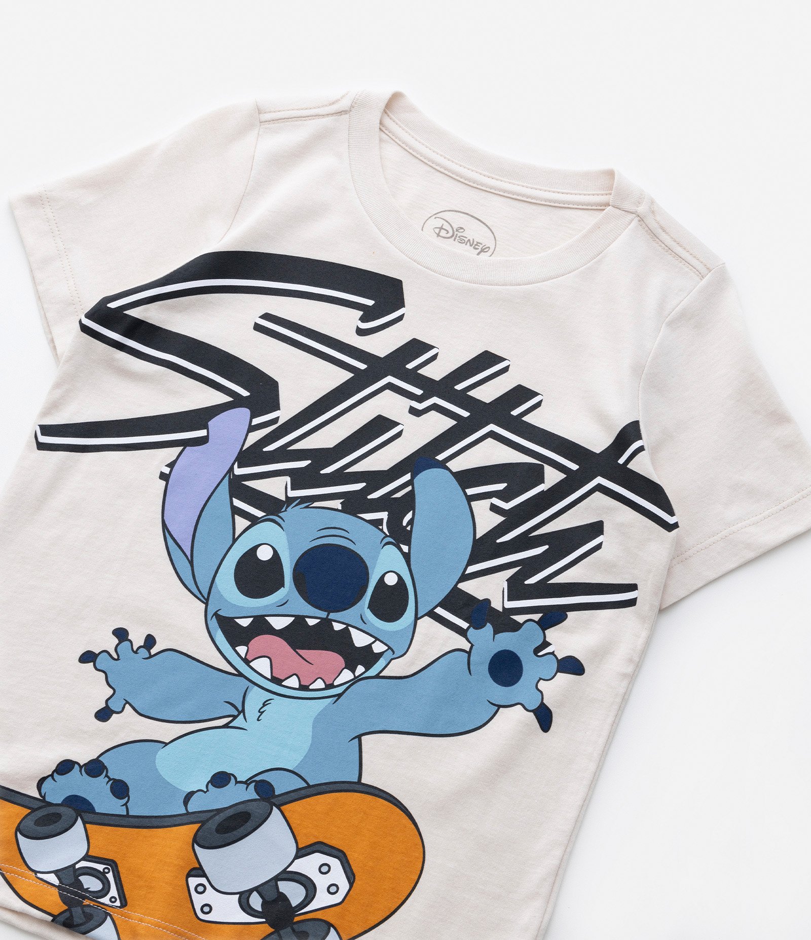 Camiseta Infantil com Estampa do Stitch no Skate - Tam 3 a 10 Anos Bege 4