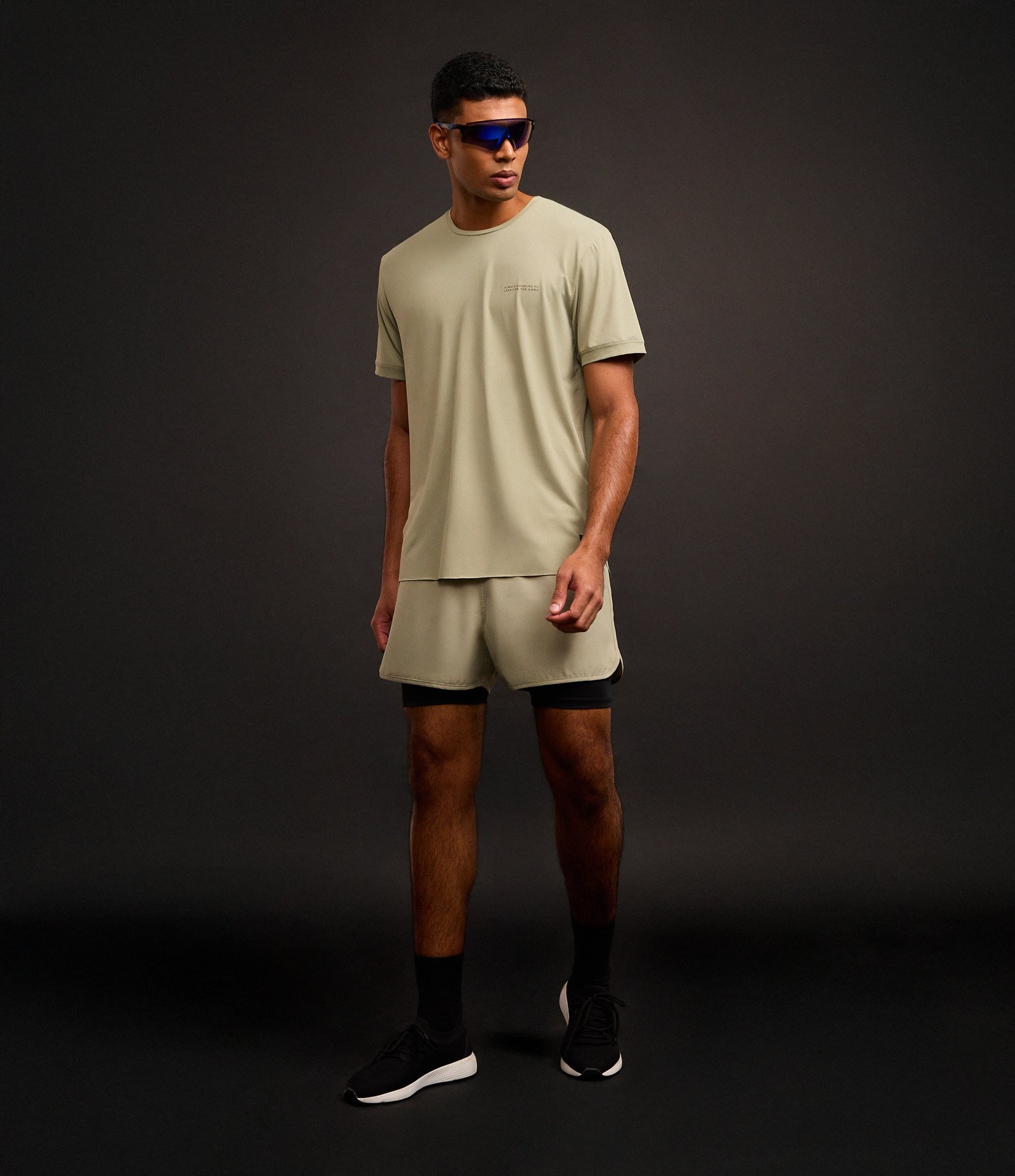 Bermuda Esportiva com Short de Compressão e Detalhe Refletivo Verde 7