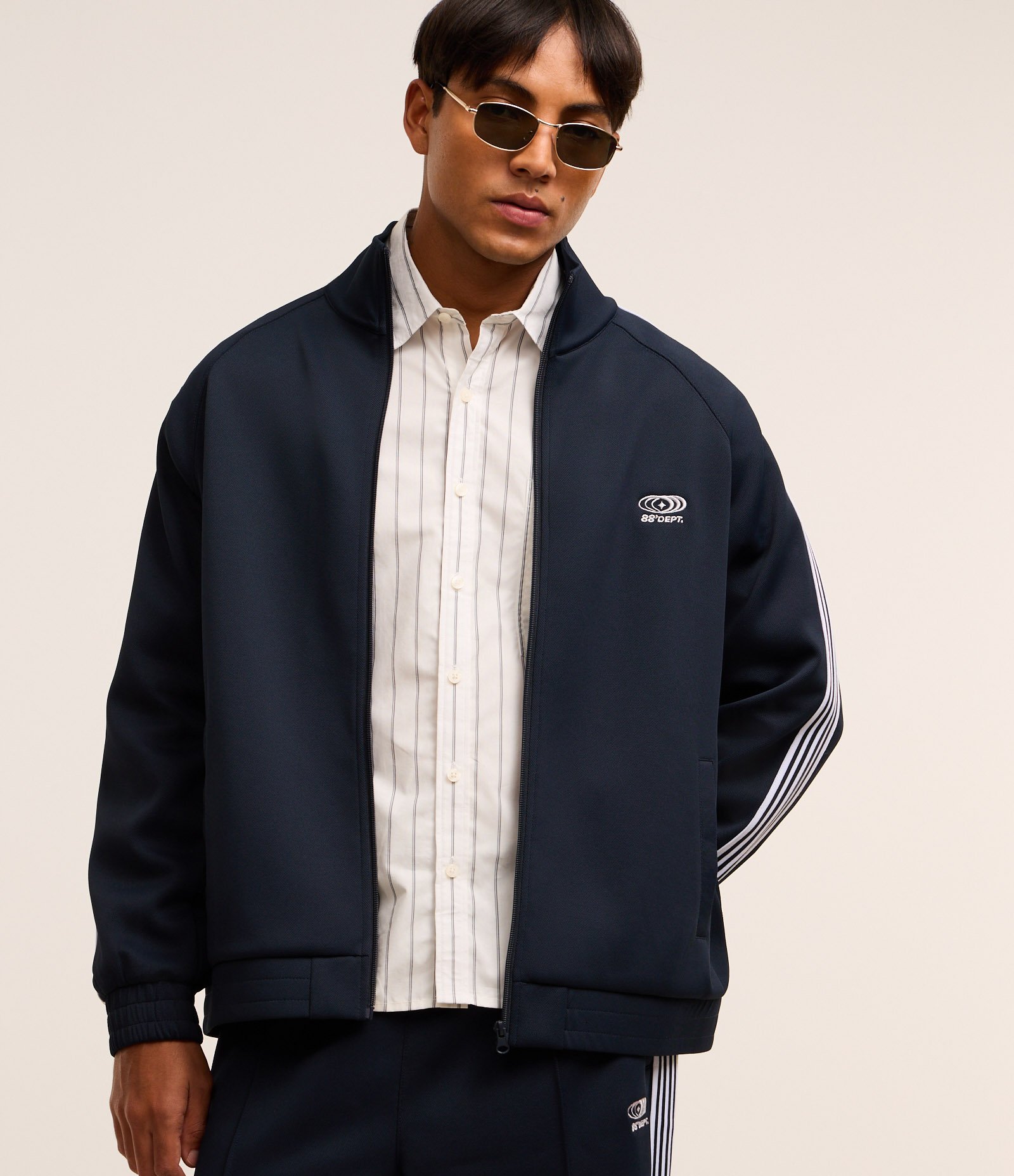 Casaco em Helanca com Bordado Localizado e Listras Contrastantes Azul 1