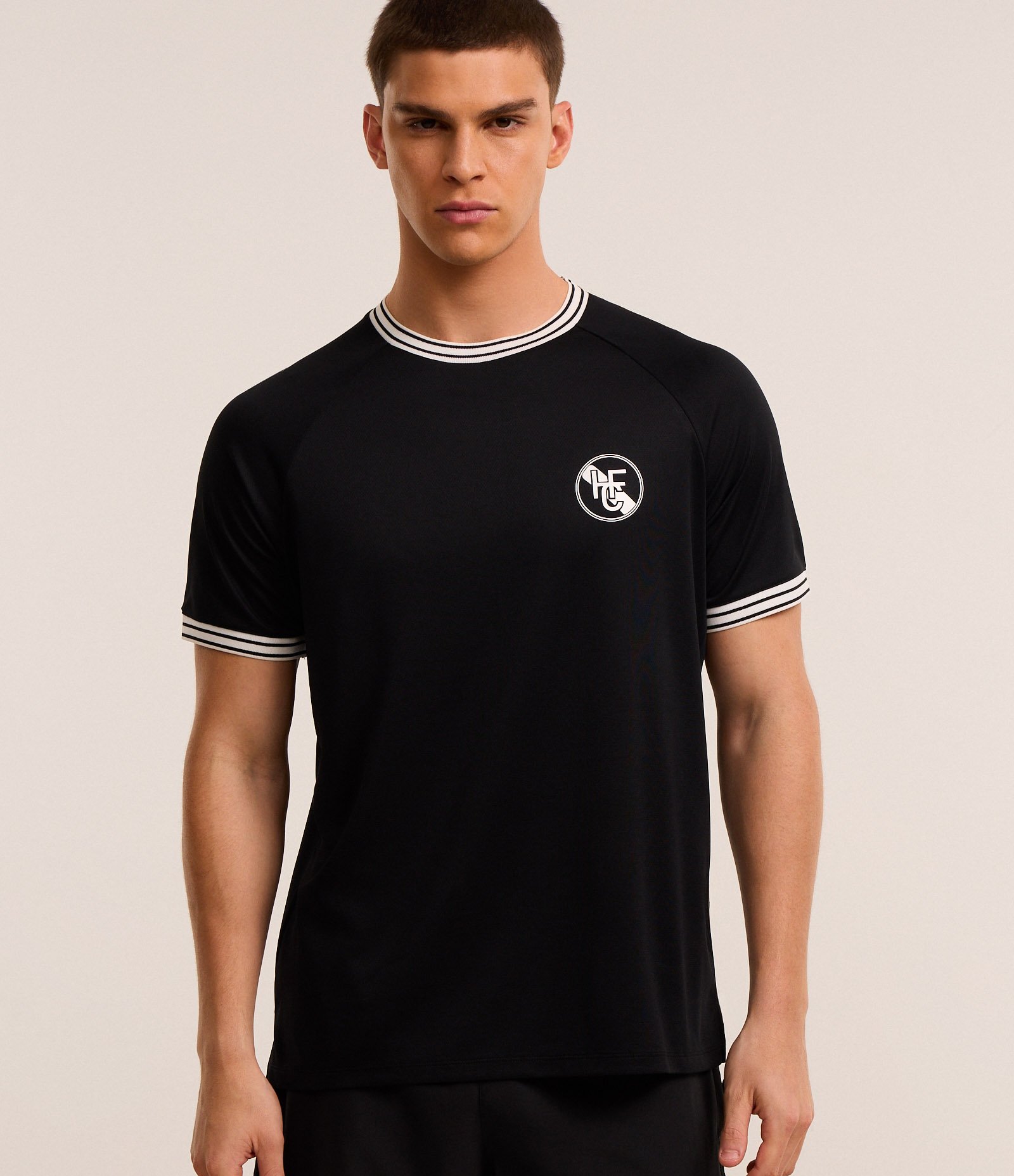Camiseta Esportiva Regular em Ribana com Estampa Localizada e Tecnologia Dry Preto 1