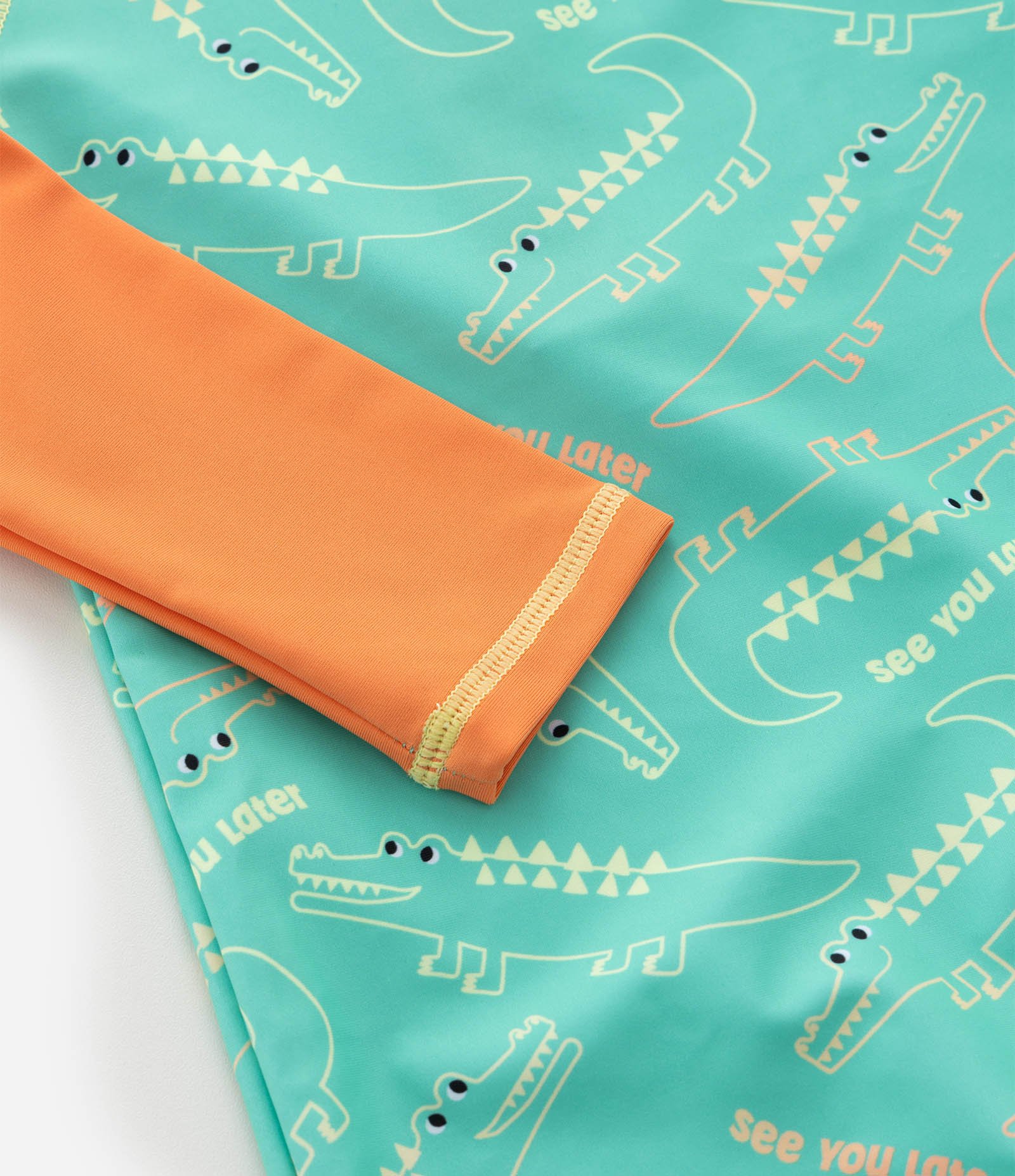 Macacão Infantil com Proteção UV e Cristas 3D - Tam 1 a 4 Anos Verde/Laranja 5