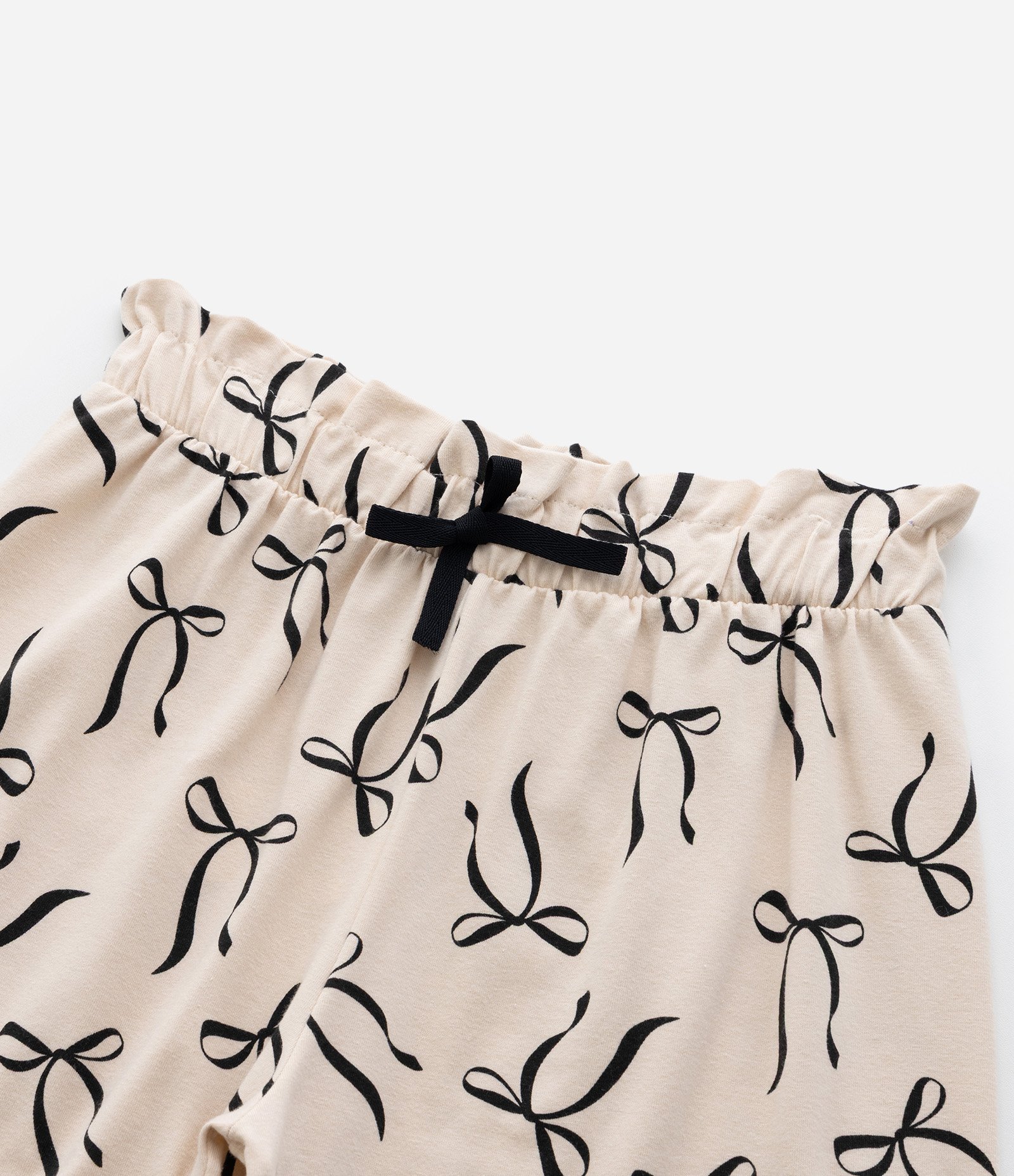 Short Clochard Infantil com Estampa Lacinho - Tam 5 a 14 Anos Bege 5