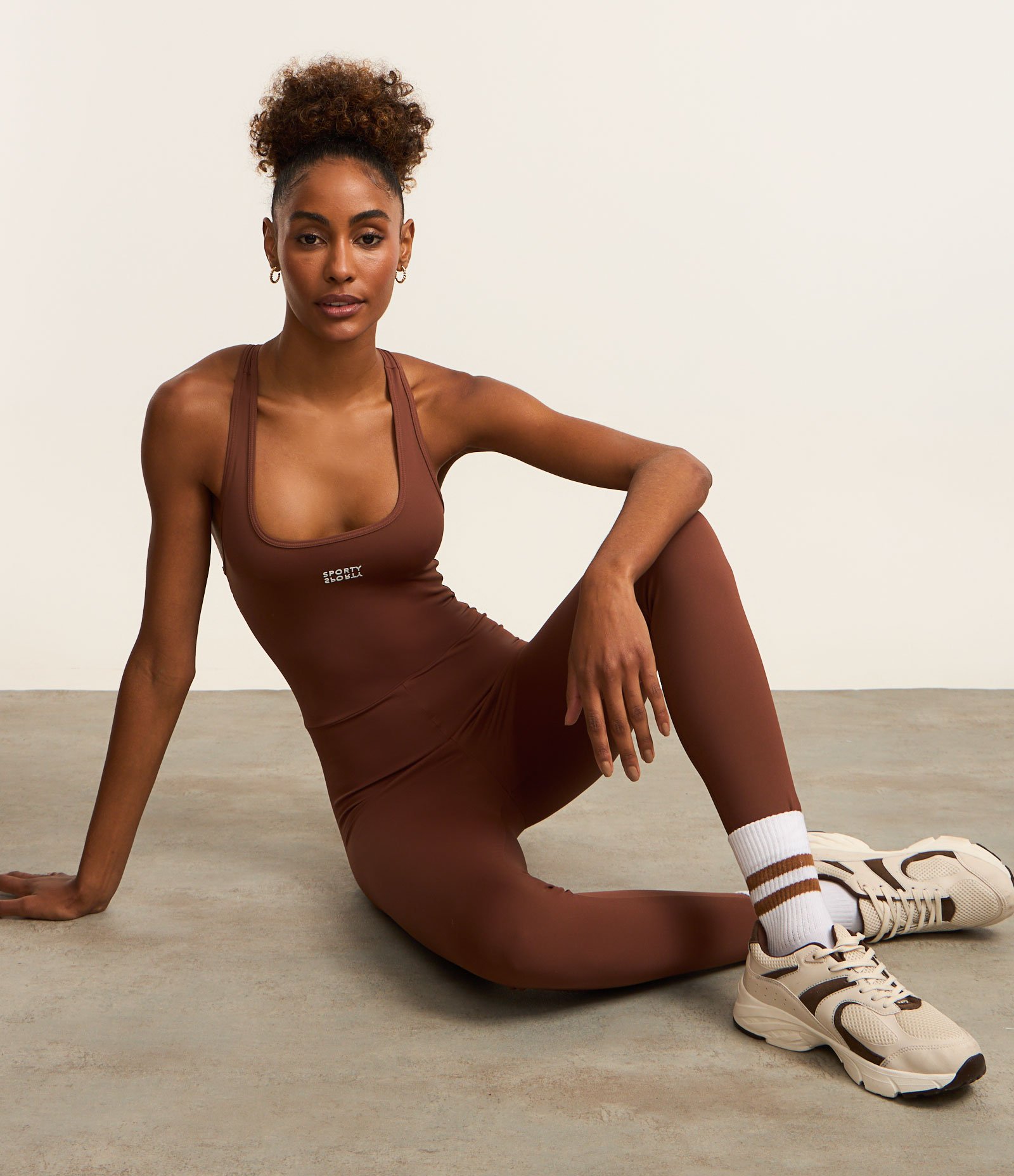 Macacão Esportivo em Microfibra com Recorte Vazado nas Costas 1