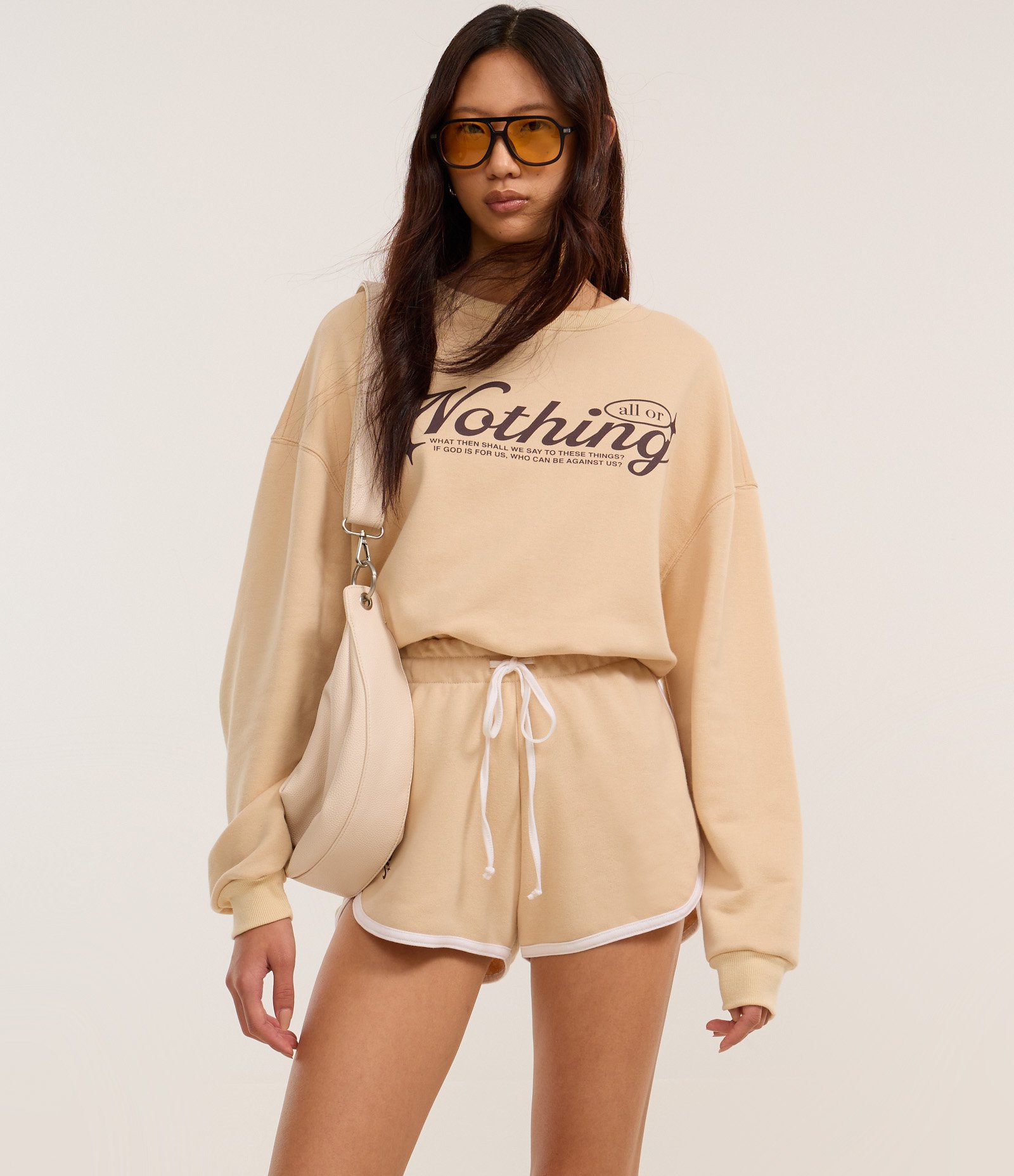 Short Curto em Moletom com Forro Fleece e Estampa Nothing Bege 2