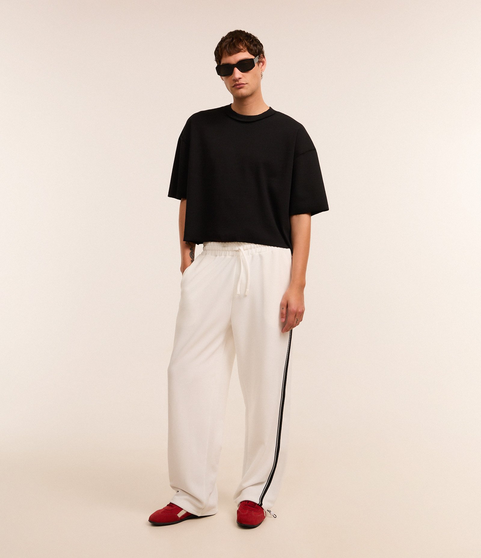 Calça Wide Leg em Helanca com Listra Lateral e Ajuste na Barra Branco 1