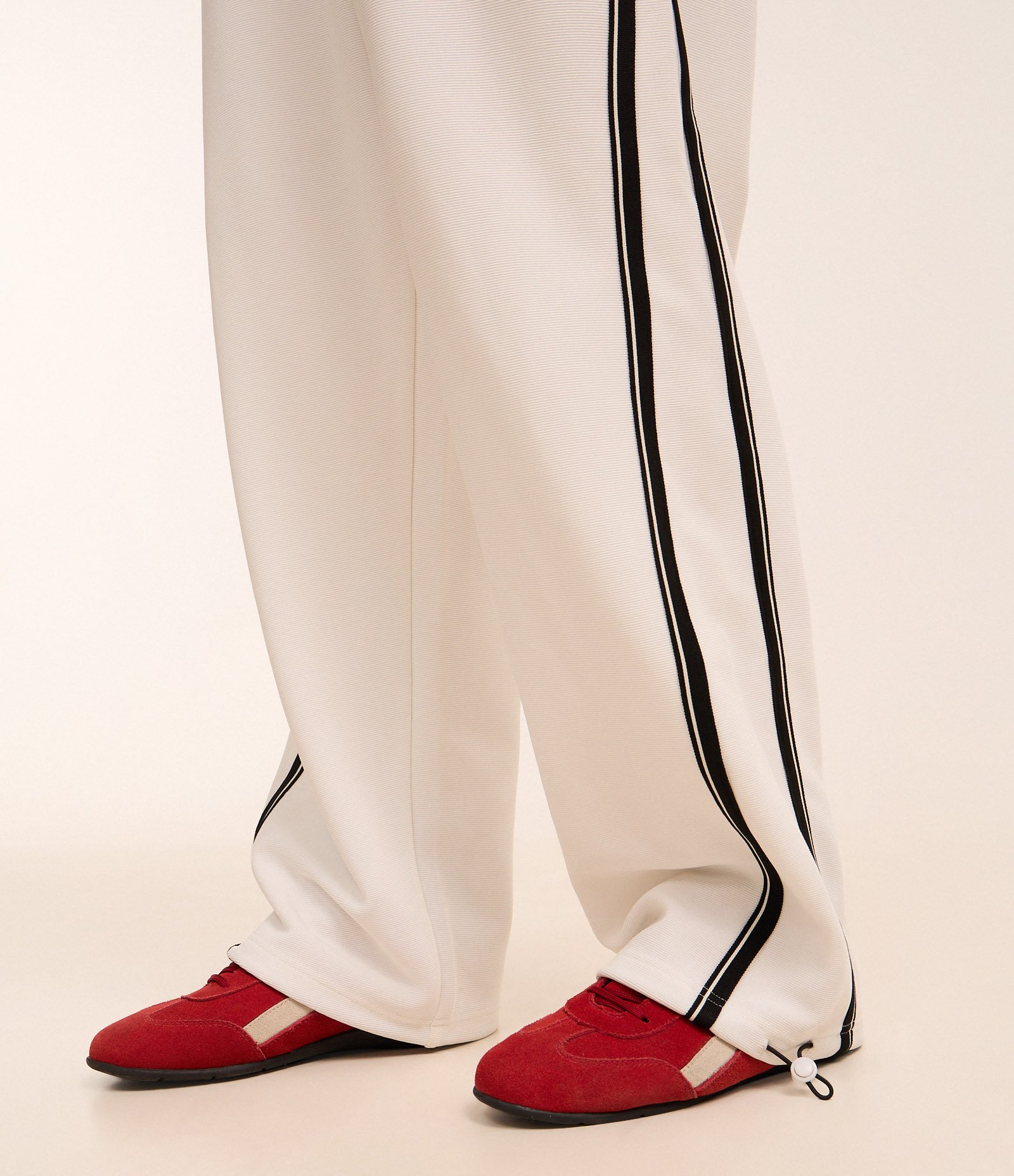 Calça Wide Leg em Helanca com Listra Lateral e Ajuste na Barra Branco 3