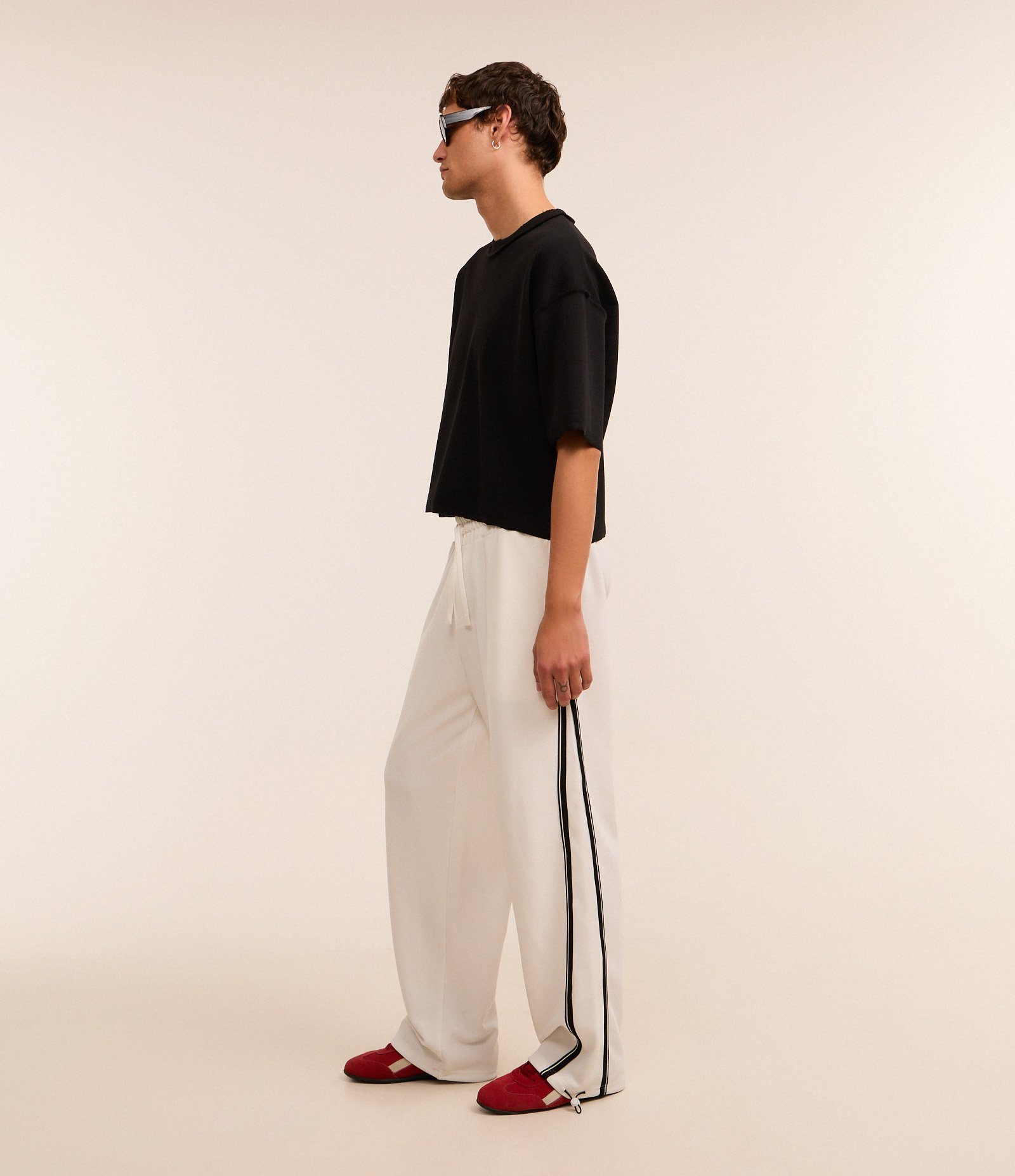 Calça Wide Leg em Helanca com Listra Lateral e Ajuste na Barra Branco 4