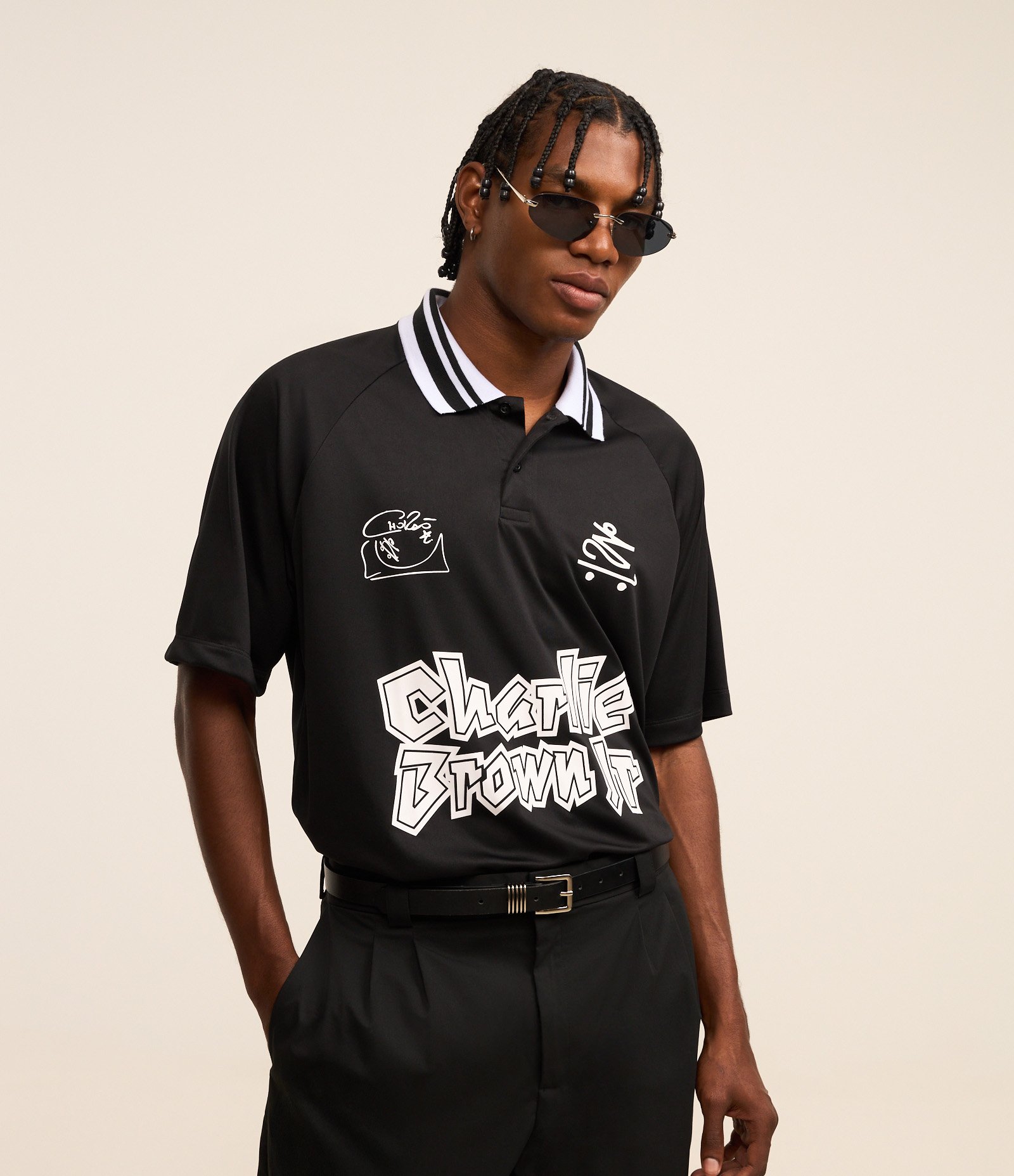 Camisa Polo Boxy com Estampa do Chalie Brown Jr Preto 1