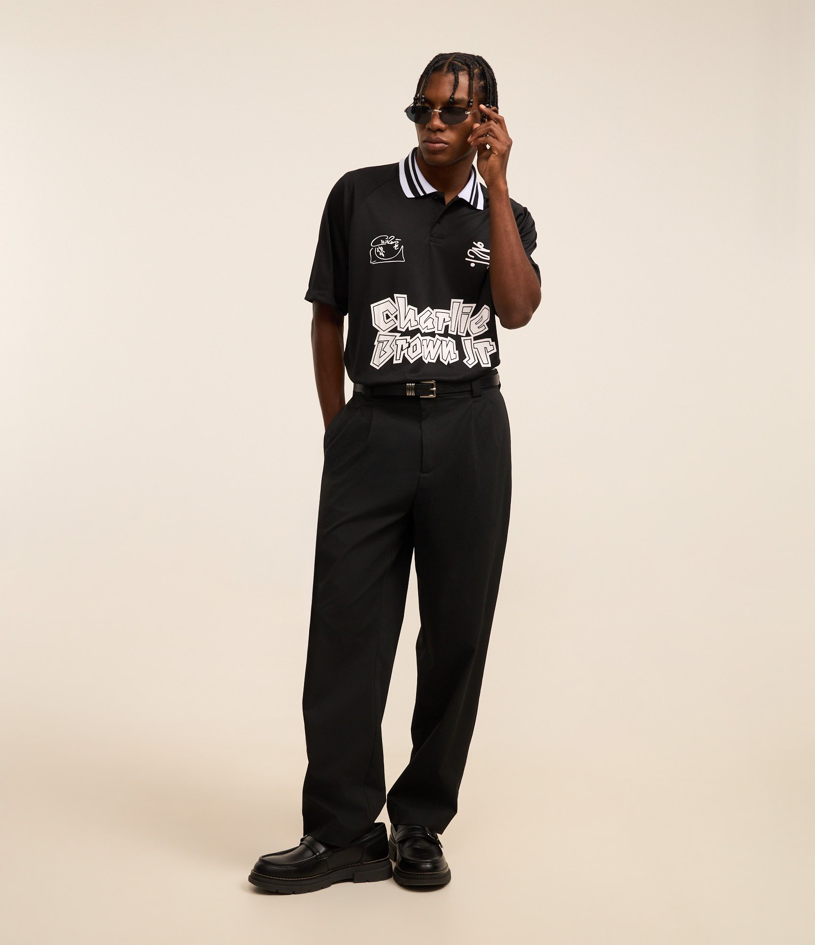 Camisa Polo Boxy com Estampa do Chalie Brown Jr Preto 2