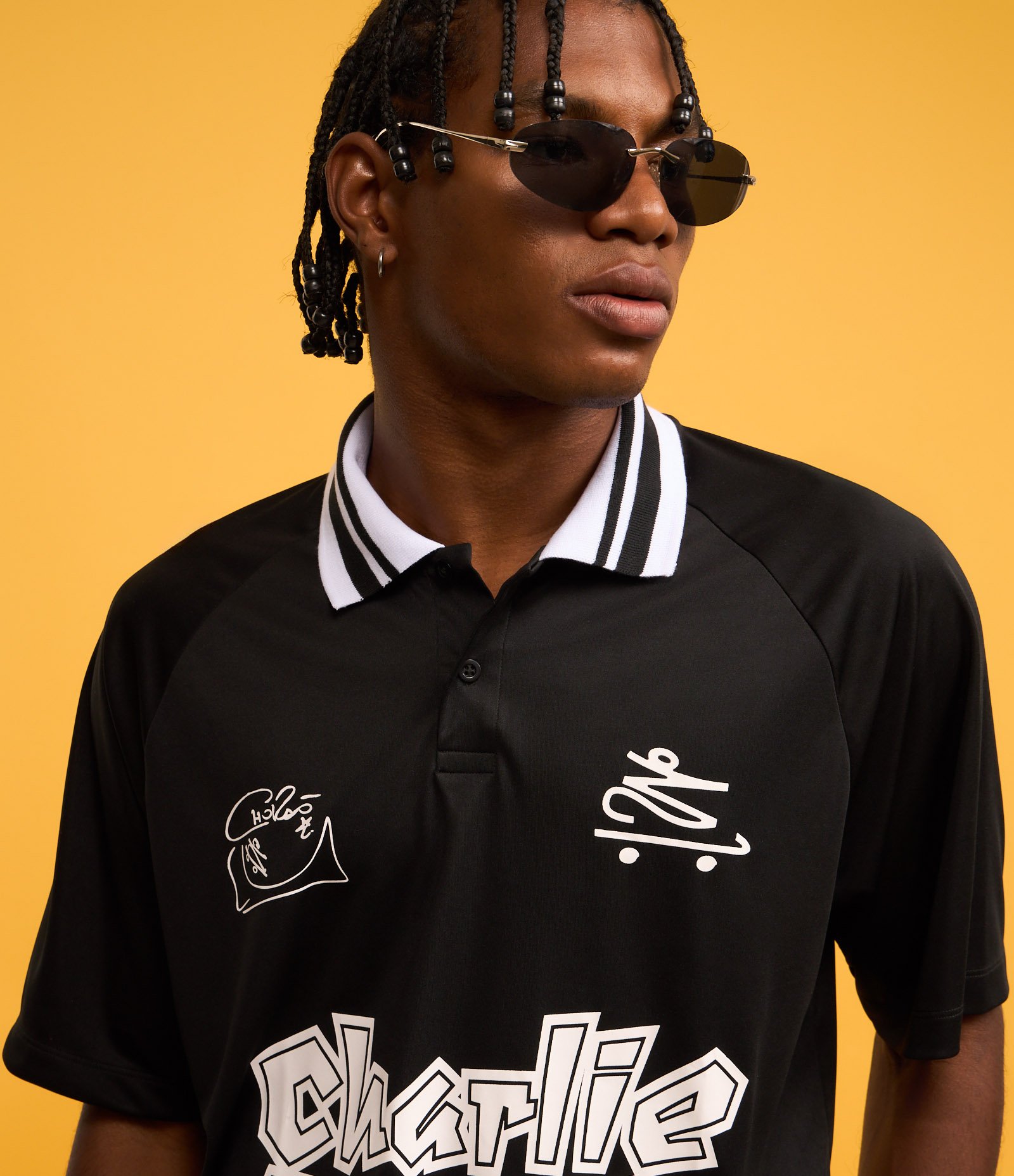 Camisa Polo Boxy com Estampa do Chalie Brown Jr Preto 6