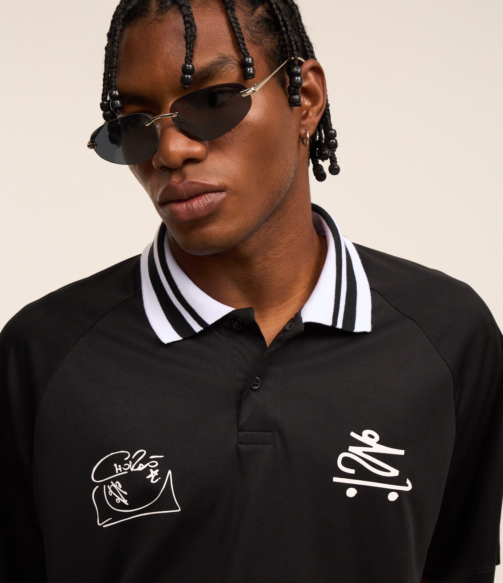 Camisa Polo Boxy com Estampa do Chalie Brown Jr Preto 7