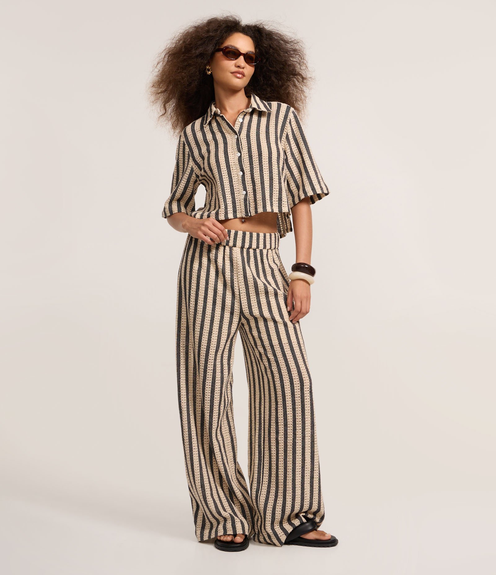 Calça Reta em Tricô com Listras e Cós Elástico Bege 1