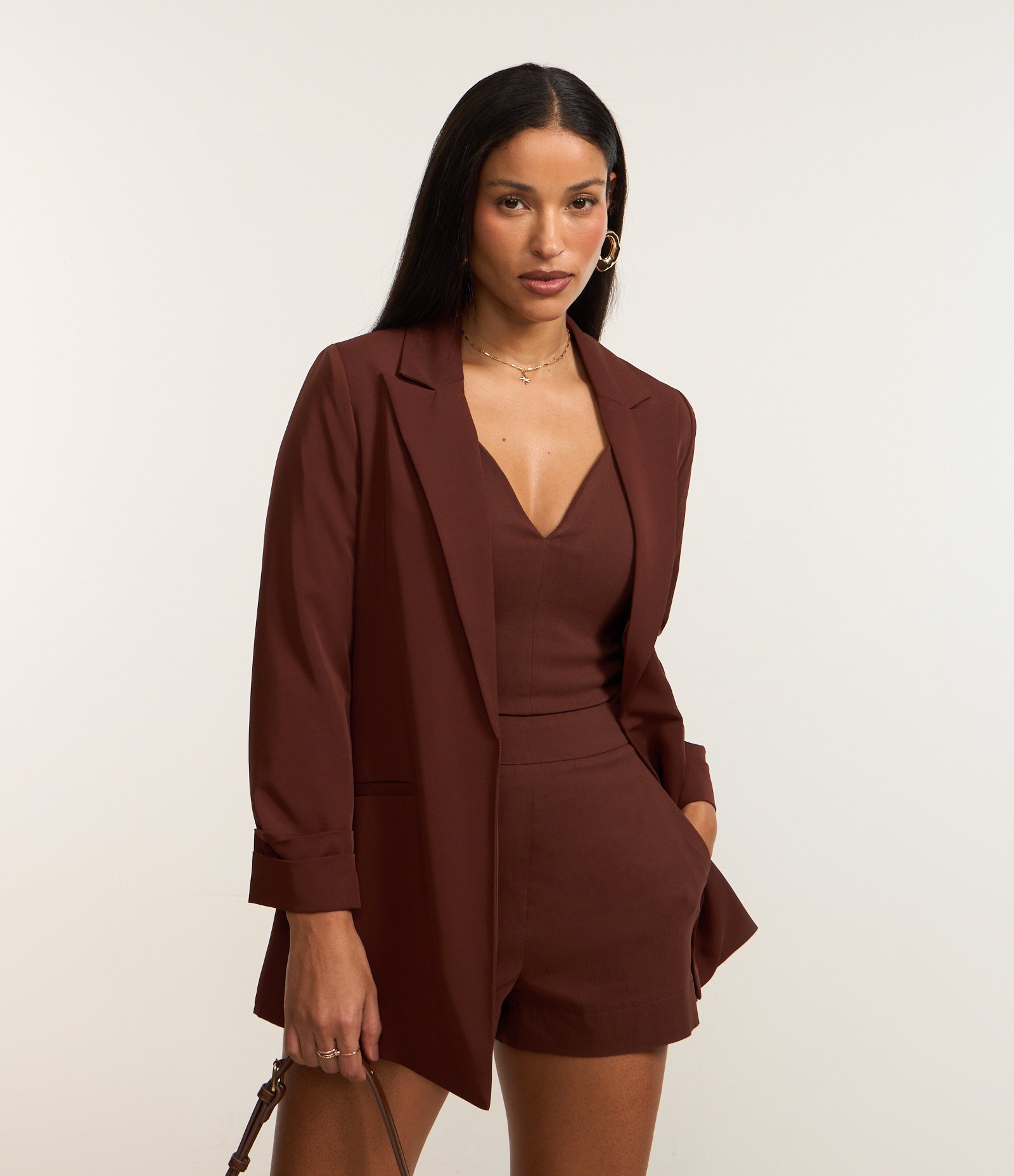 Blazer Oversized Alongado em Alfaiataria com Pregas no Punho Marrom Intenso 1