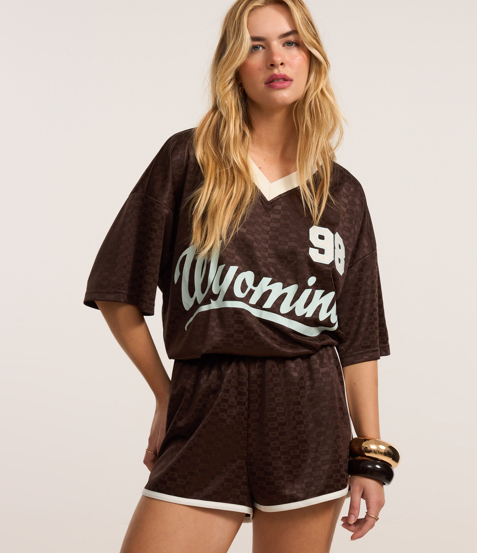 Bermuda Runner Sportcore com Viés Contrastante Marrom 1