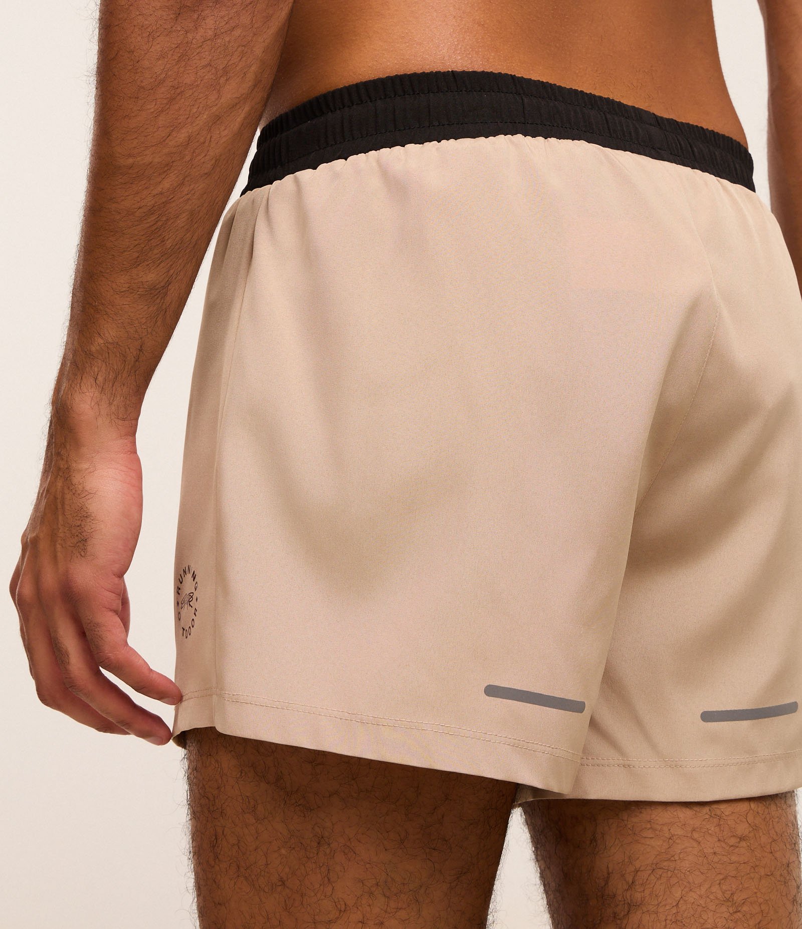 Bermuda Esportiva Corrida com Cós Contrastante e Detalhe Refletivo Bege 9