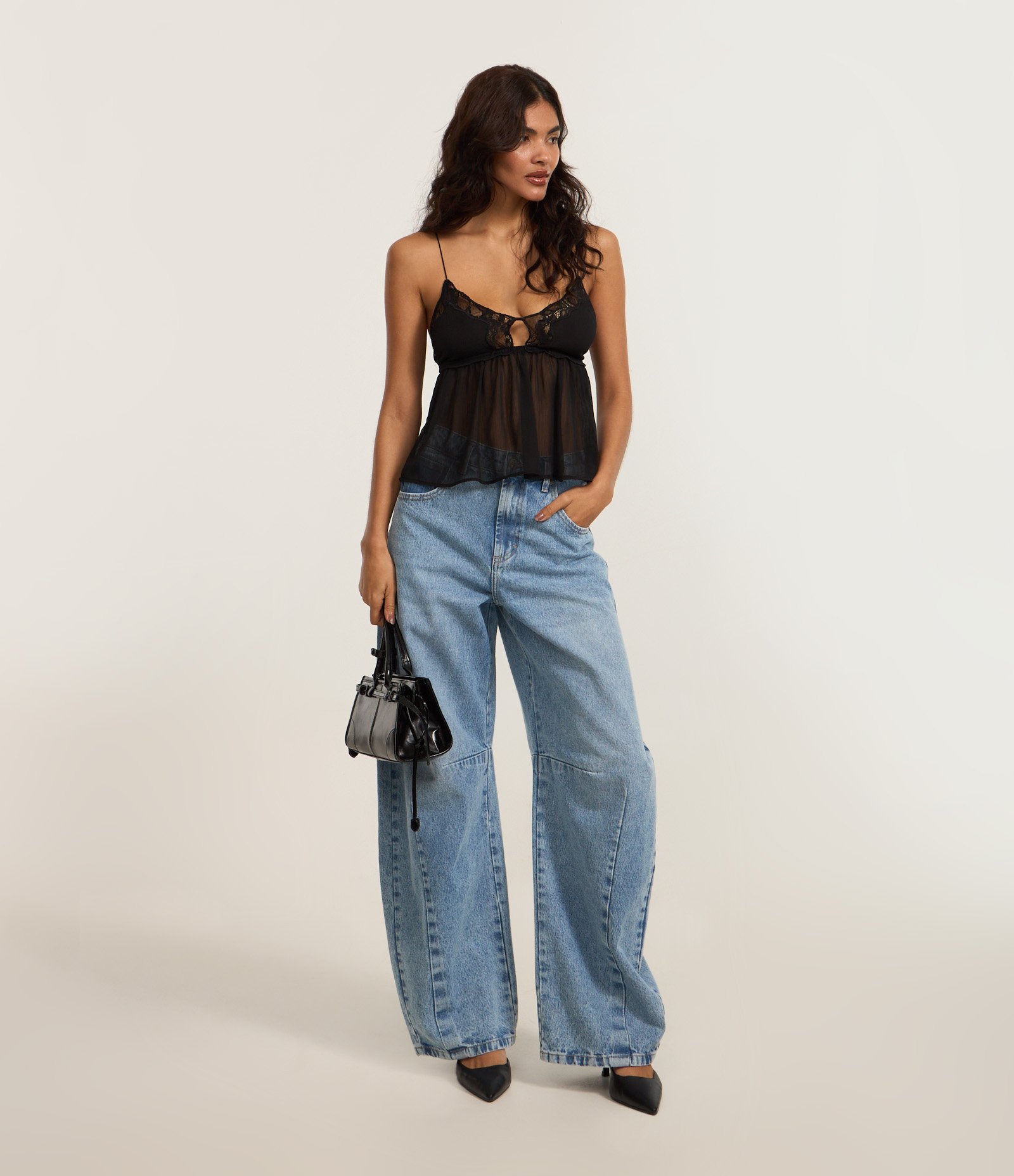 Calça Barrel em Jeans com Recortes na Barra Azul Claro 1