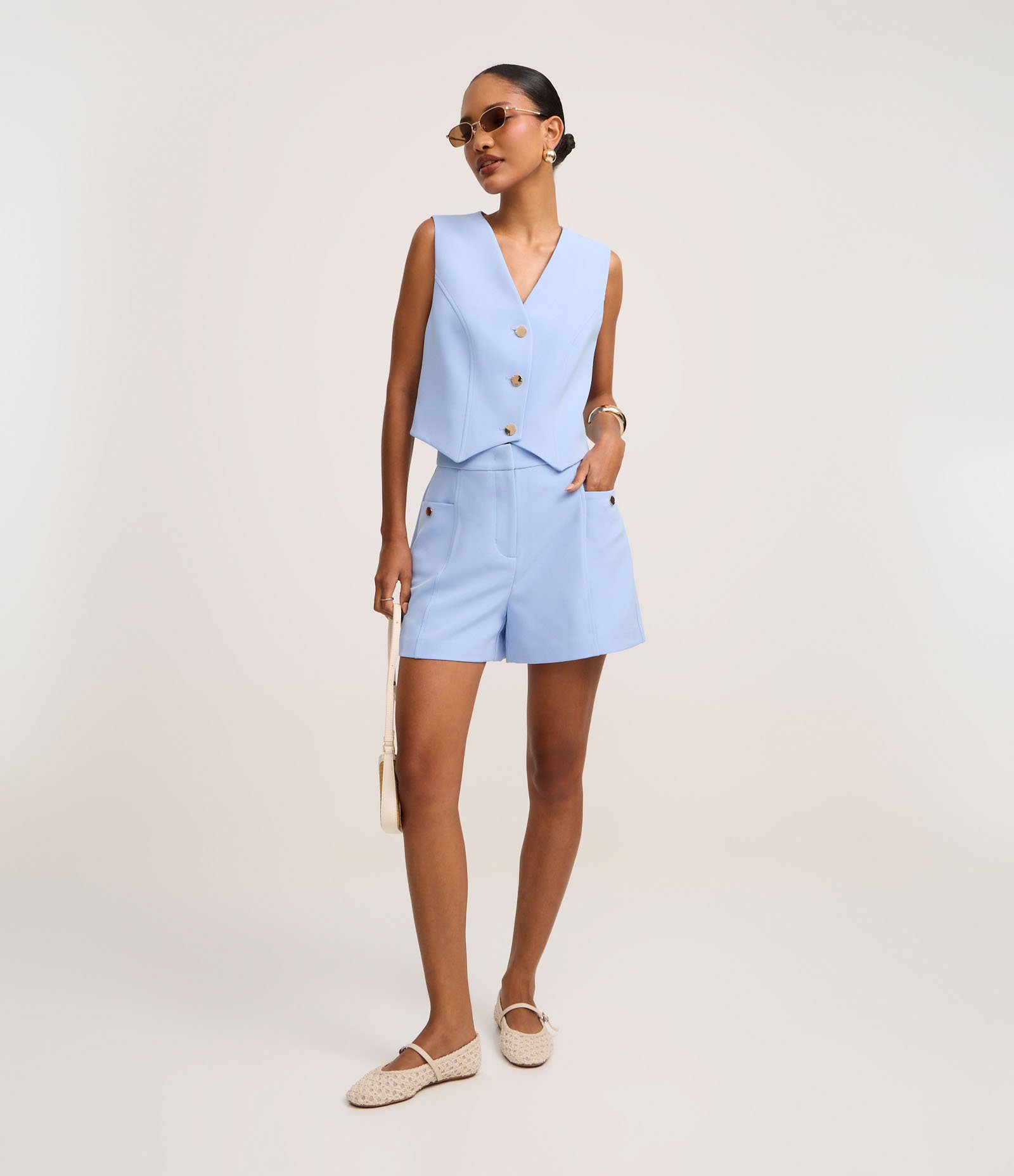 Short Alfaitado Cintura Alta com Bolsos Laterais Azul 1