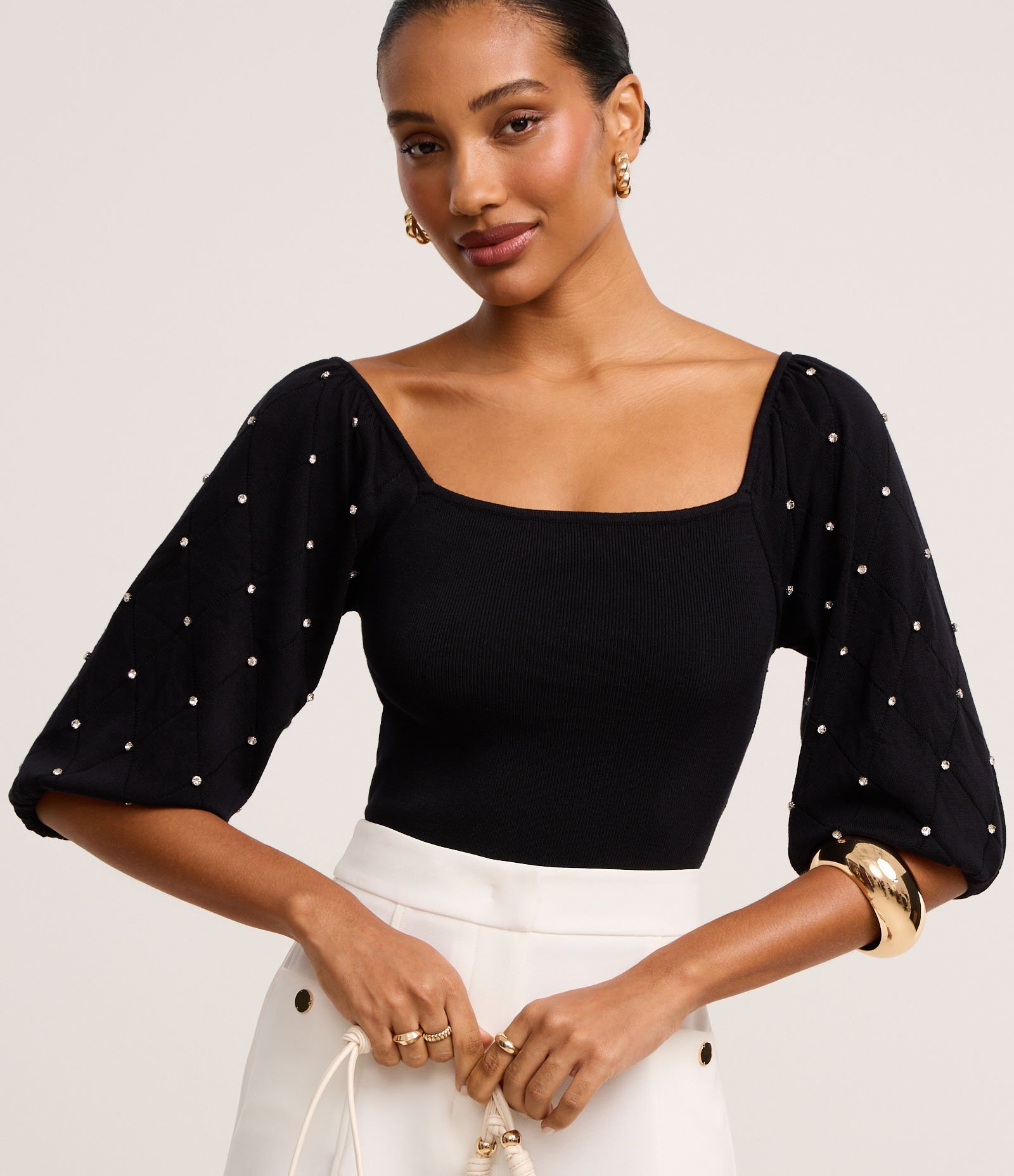 Blusa em Tricô com Brilho e Textura na Manga Bufamte Preto 1