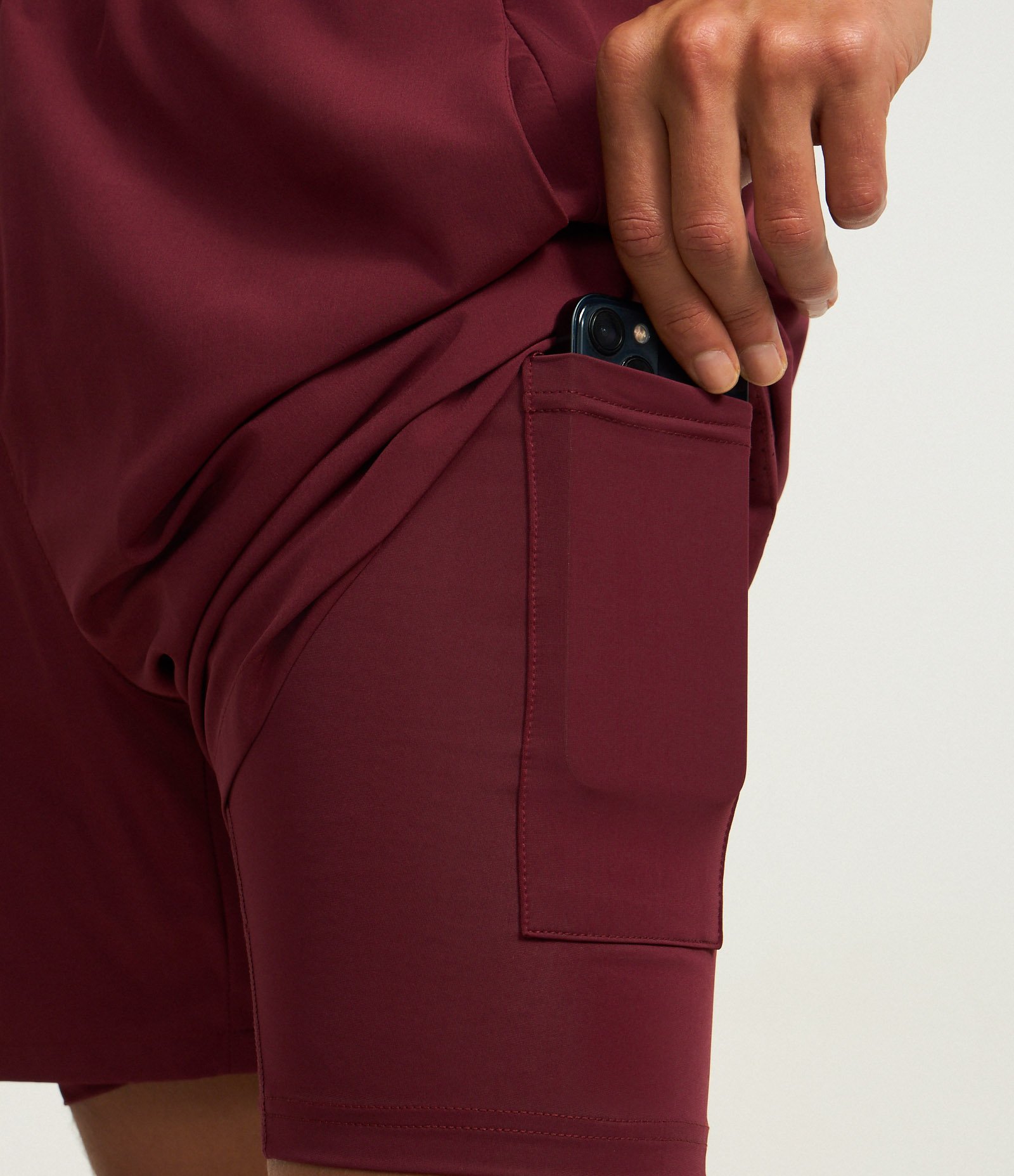 Bermuda Esportiva com Short de Compressão Bordo 3