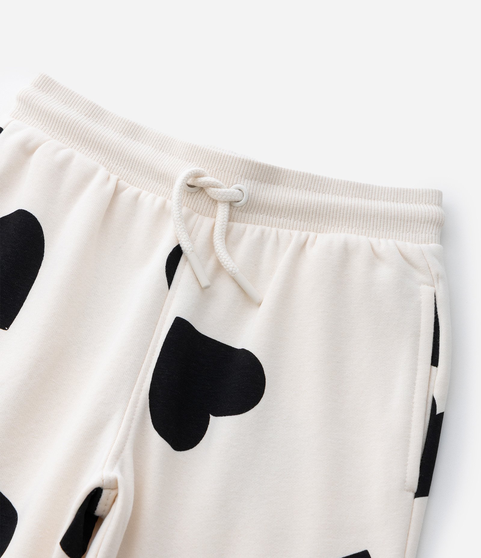Calça Jogger Infantil Estampa de Corações- Tam 5 a 16 anos Bege 6