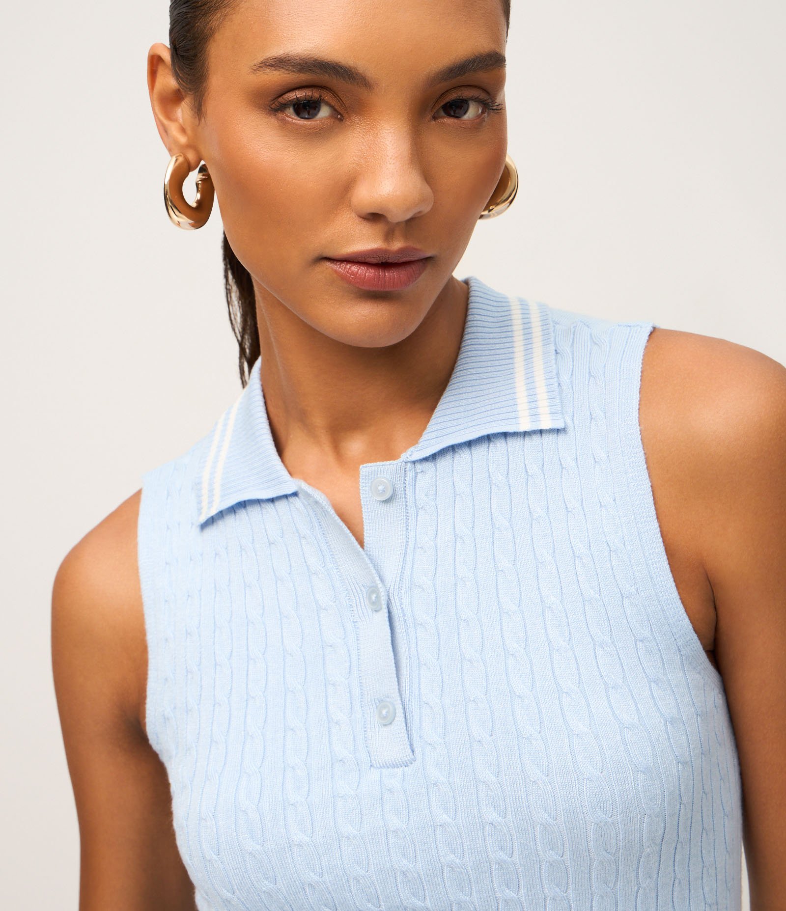 Blusa Manga Curta com Gola Polo em Tricô Azul 1