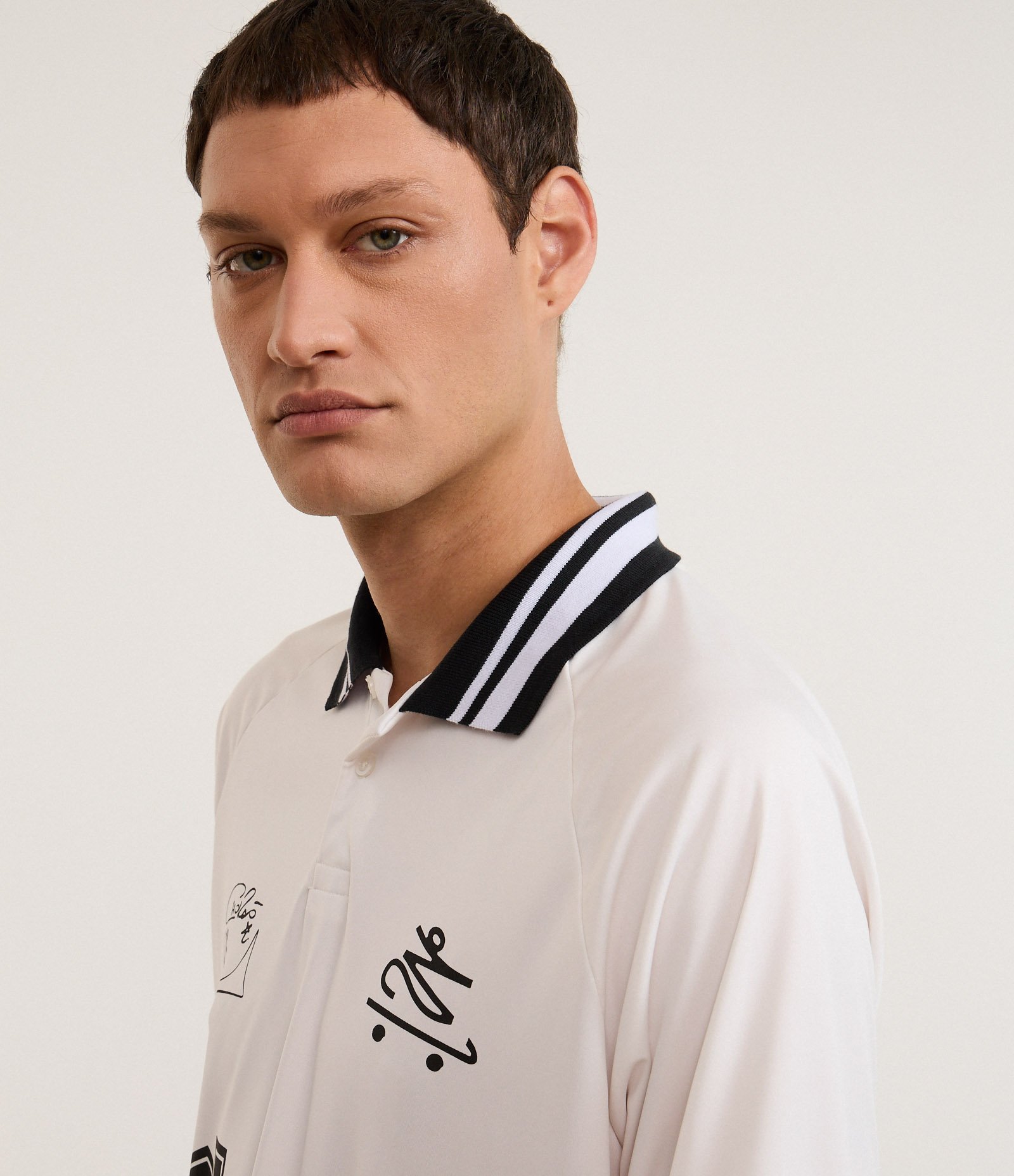 Camisa Polo Boxy com Estampa do Chalie Brown Jr Branco 6