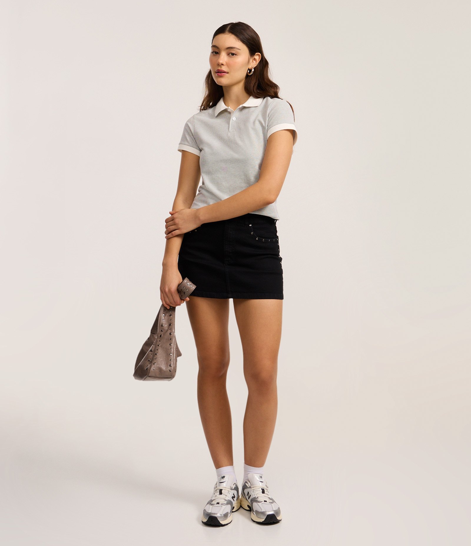 Minissaia em Jeans com Tachas nos Bolsos Preto 1