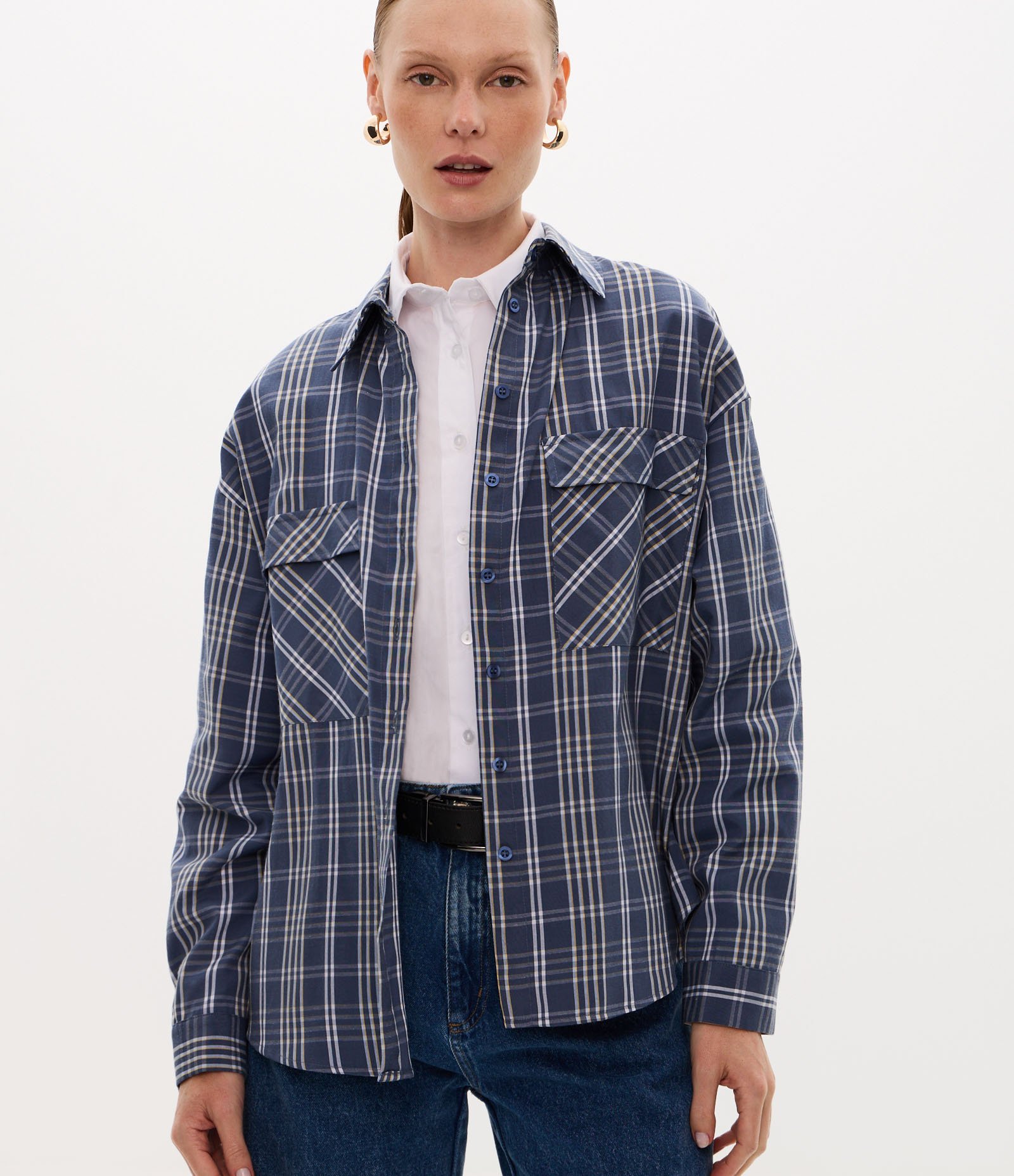 Camisa Alfaiatada com Estampa Xadrez Bolsos e Recortes Azul 1