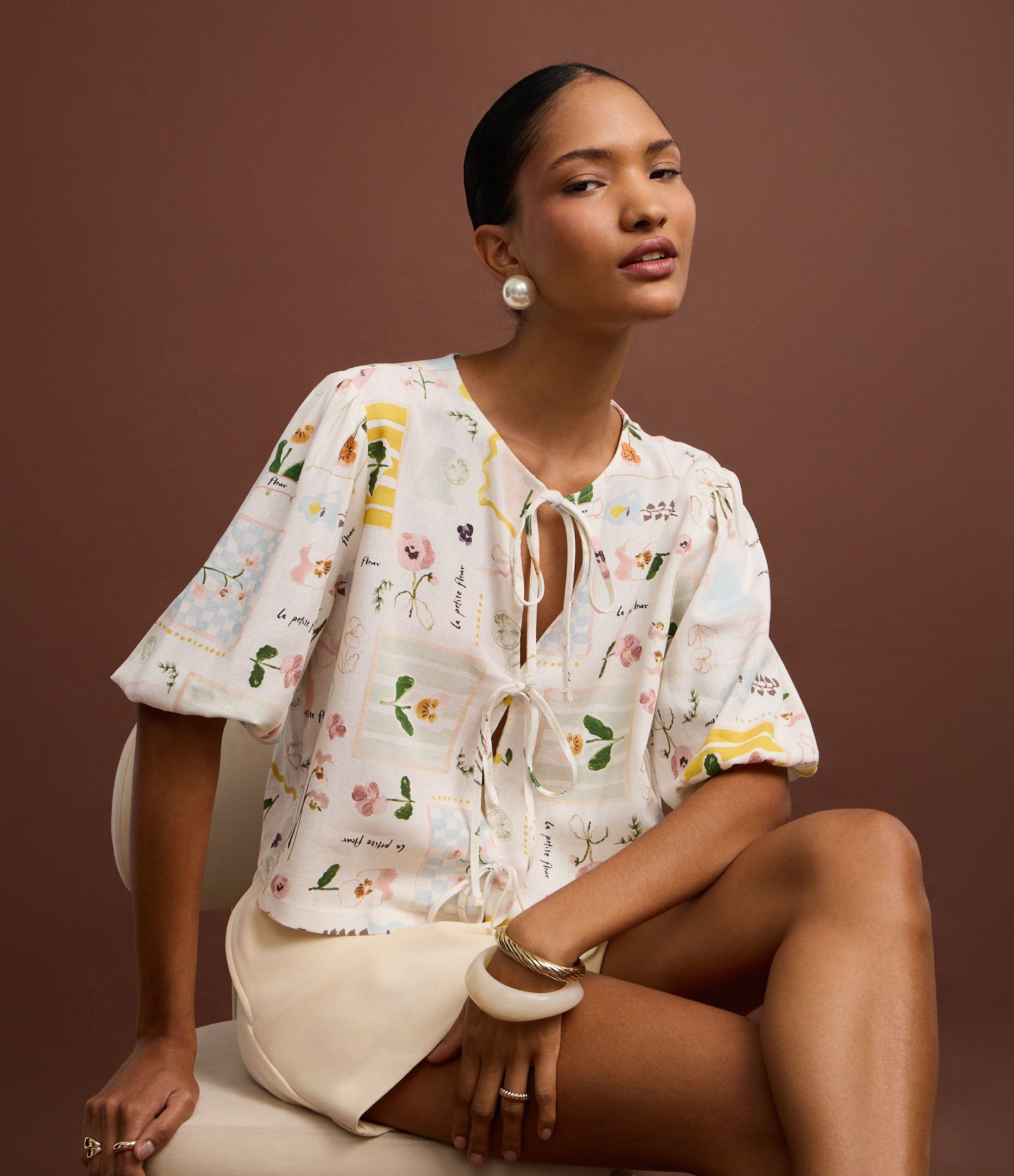 Blusa em Viscolinho com Amarração e Estampa Floral Off White 6