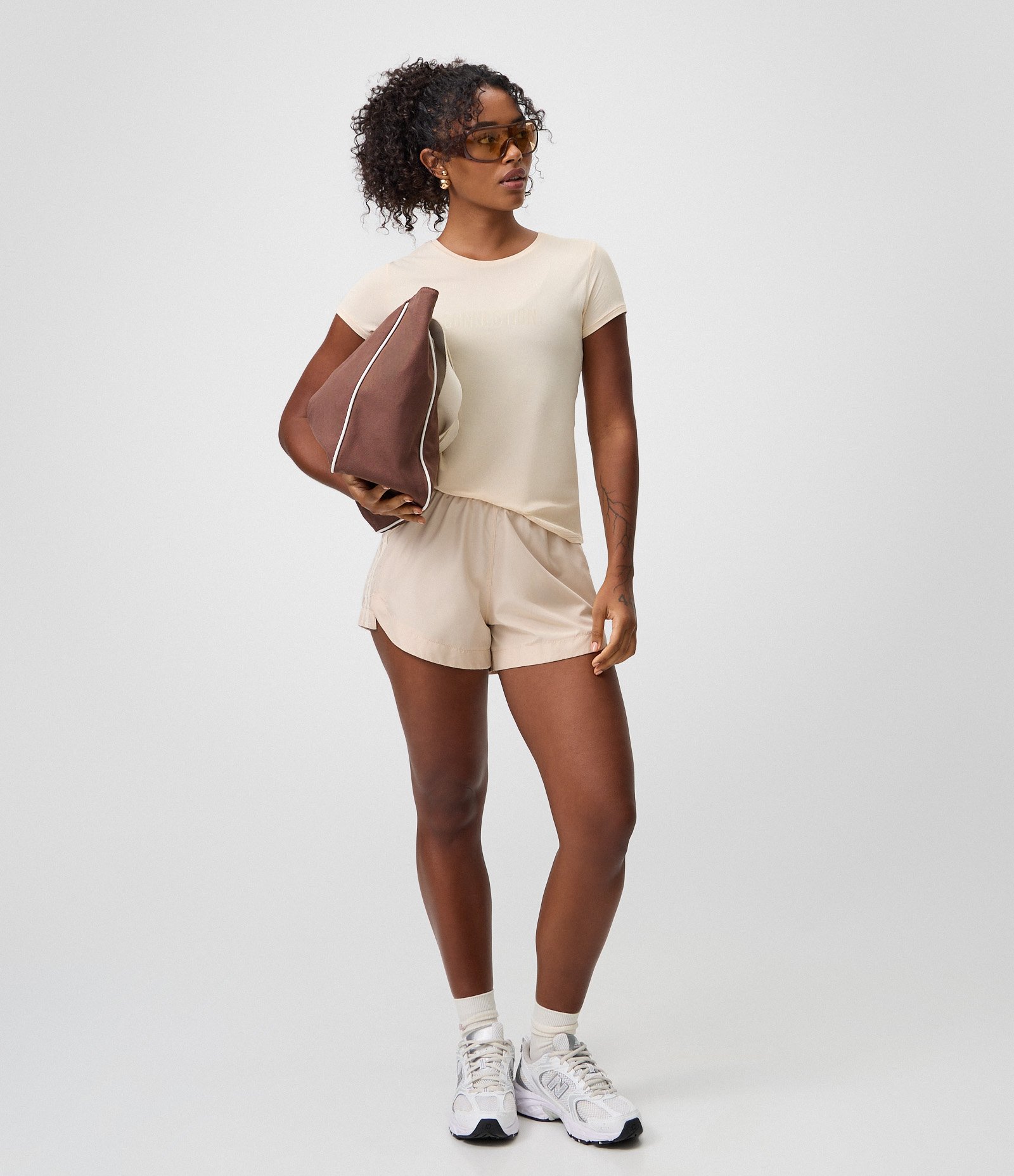 Bermuda Runner Esportiva com Listras Laterais Amarelo 1