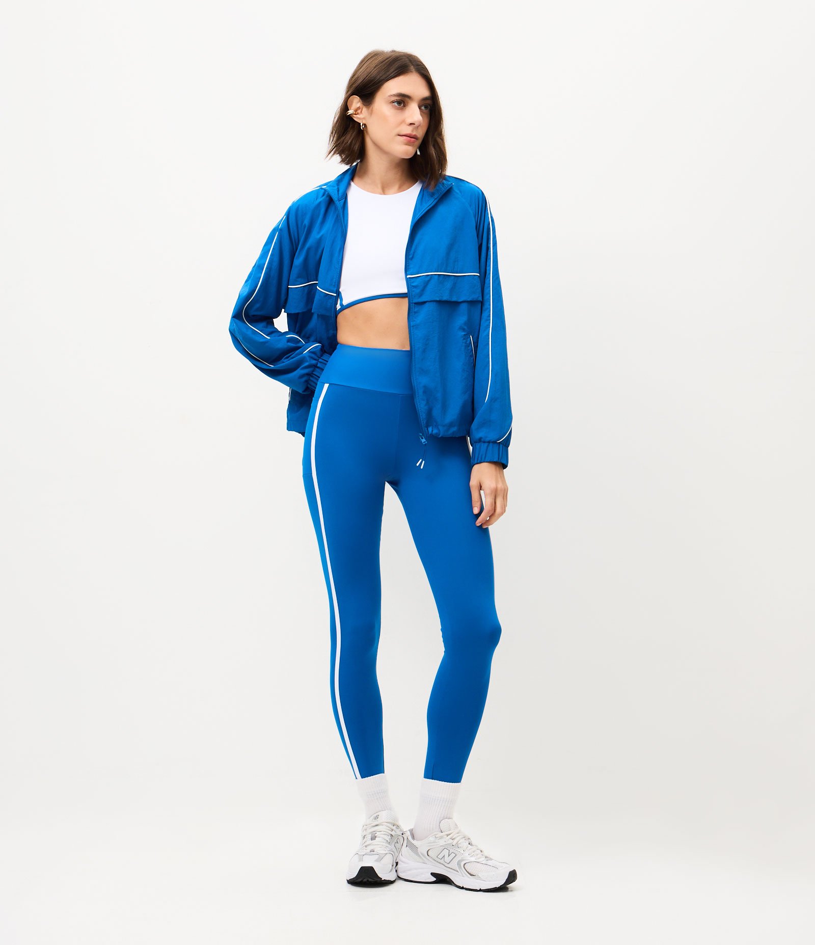 Calça Legging Esportiva em Microfibra com Bolsos e Viés Contrastante Azul 5