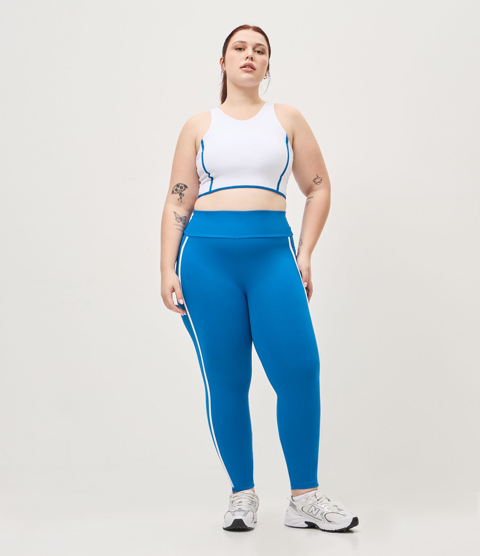 Calça Legging Esportiva em Microfibra com Bolsos e Viés Contrastante Azul 1