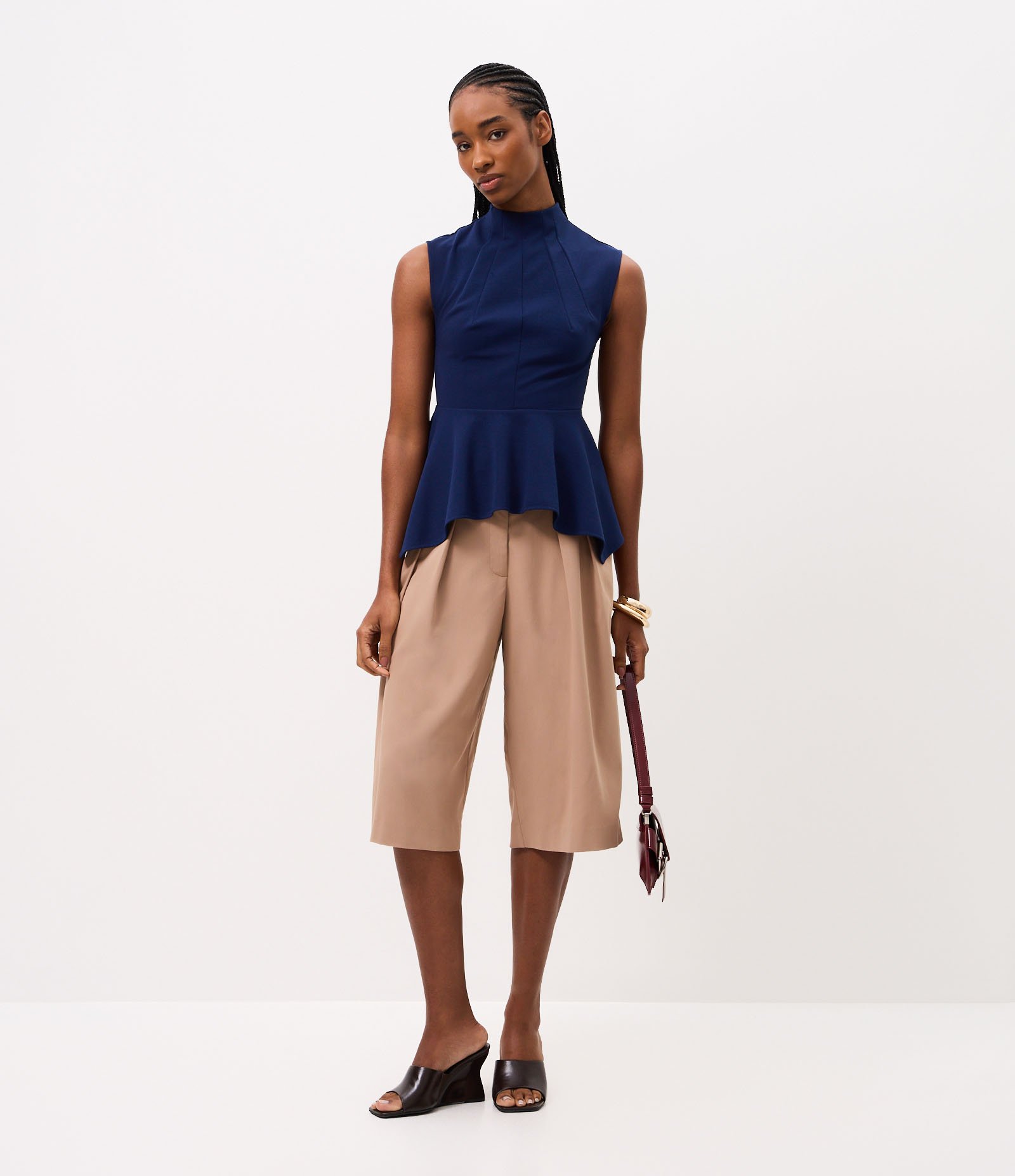 Blusa com Gola Alta e Barra Peplum Assimétrica Azul 2
