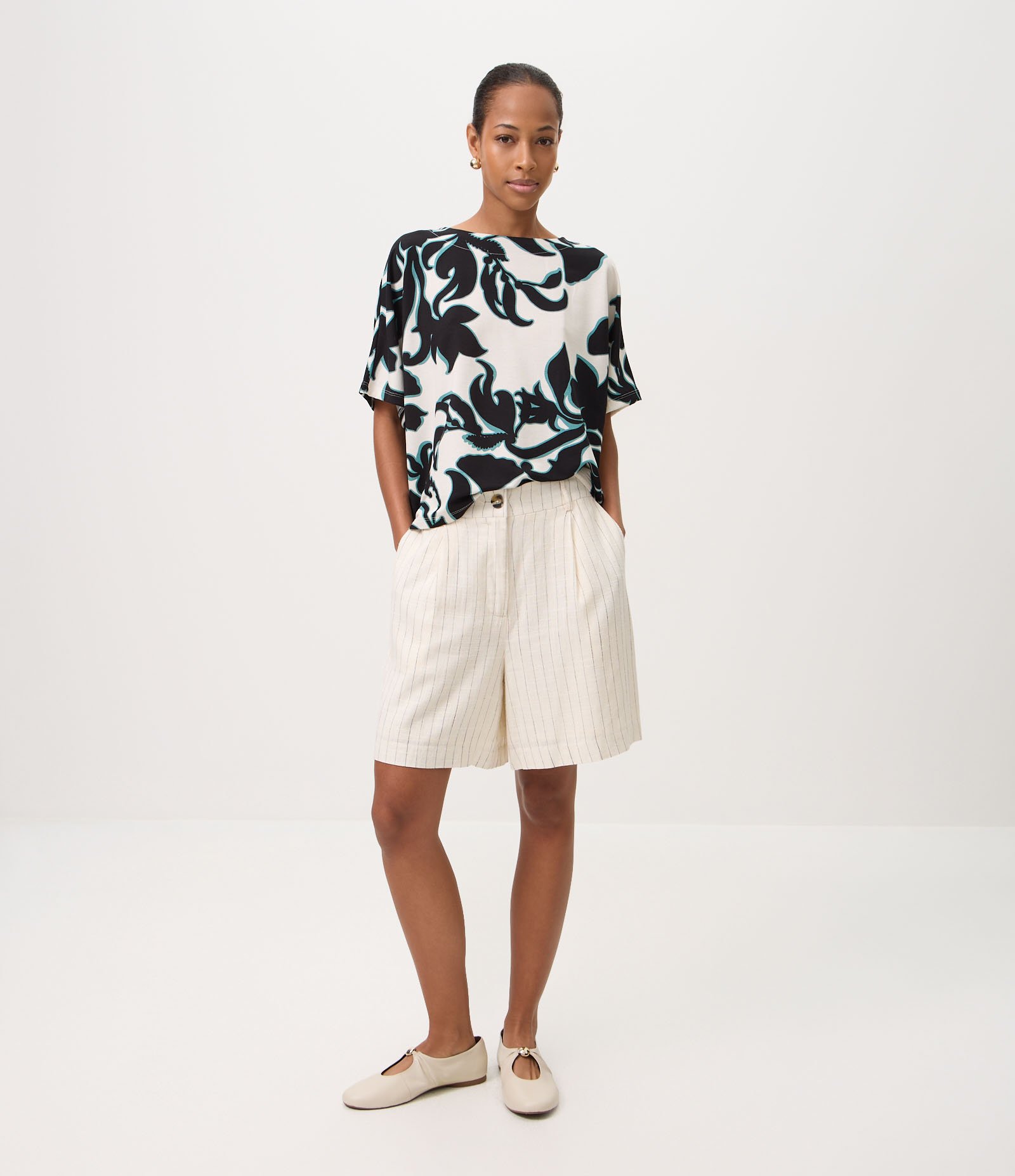 Blusa em Piquet com Estampa Floral Abstrata Branco 1