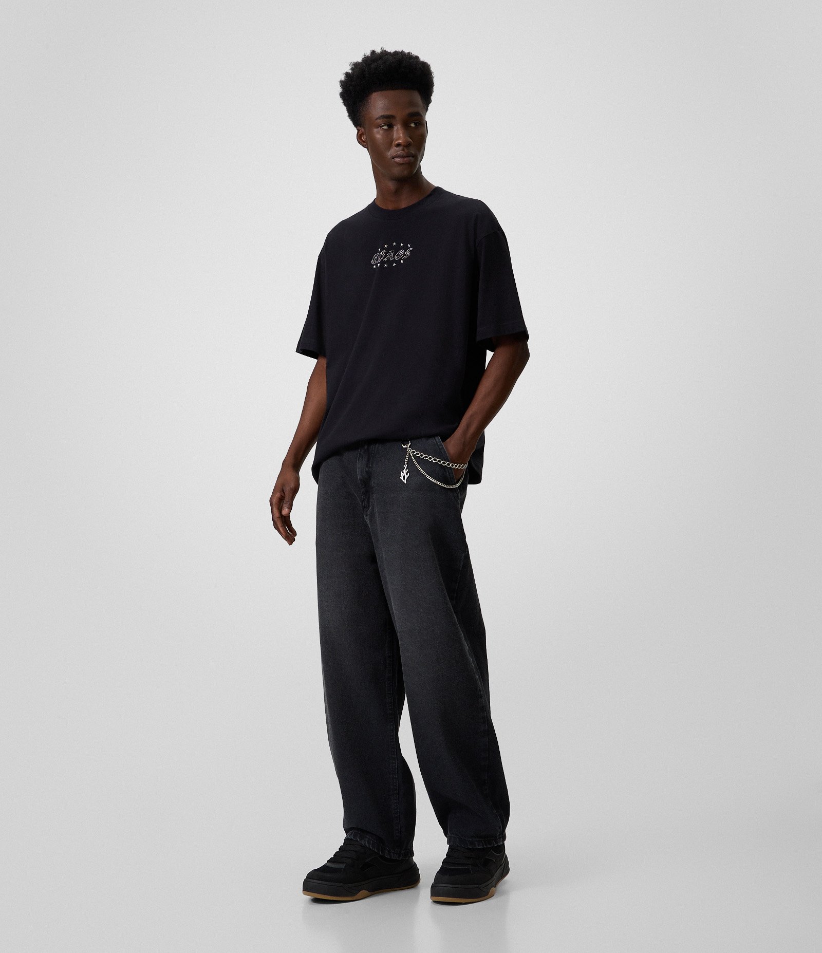 Camiseta Boxy em Algodão com Estampa Chaos e Estrelas Preto 2