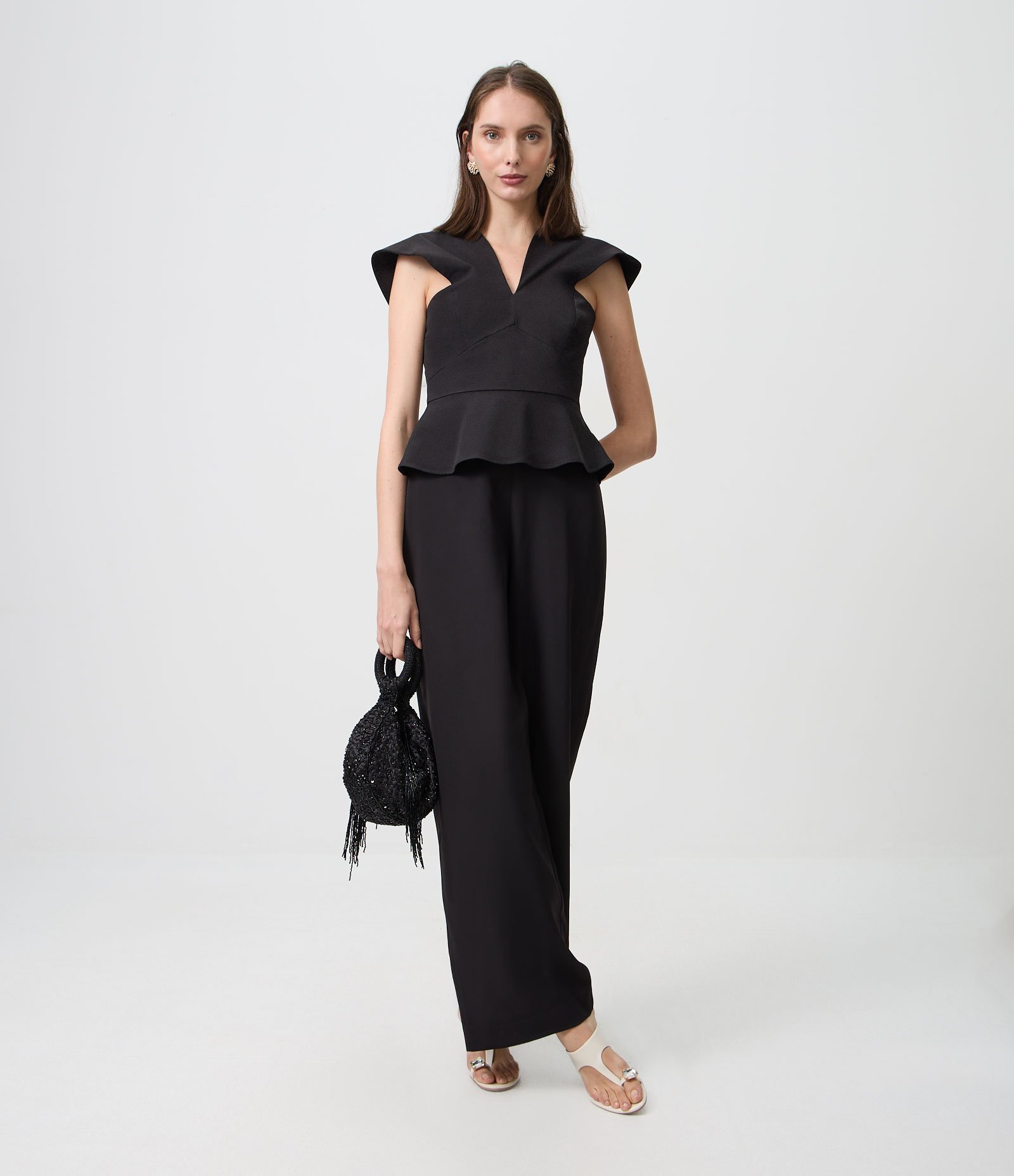 Macacão com Peplum Alfaiatado e Decote Estruturado Preto 1