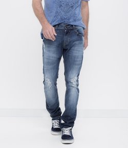 Calça Skinny Masculina em Jeans com Puídos 