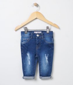 Calça Skinny Infantil em Jeans com Puídos - Tam 0 a 18 meses