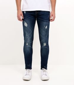 Calça Skinny com Puídos em Jeans
