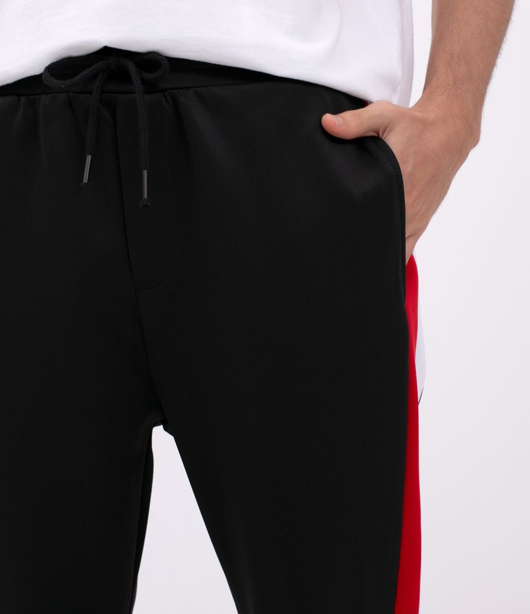 calça jogger com listra lateral helanca