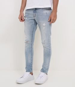Calça Skinny em Jeans Claro com Puídos e Elastano