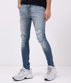 Calça Jeans Skinny com Puídos 