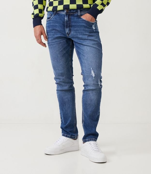 Calça Skinny Jeans com Puídos e Bolsos Azul 2