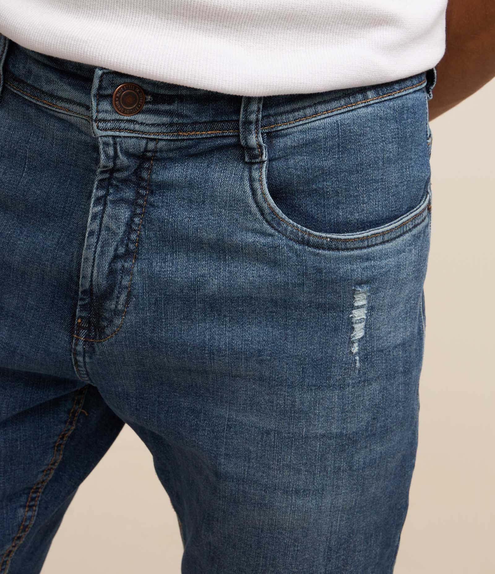 Calça Skinny Jeans com Puídos e Bolsos Azul 4
