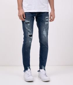 Calça Super Skinny em Jeans com Puídos